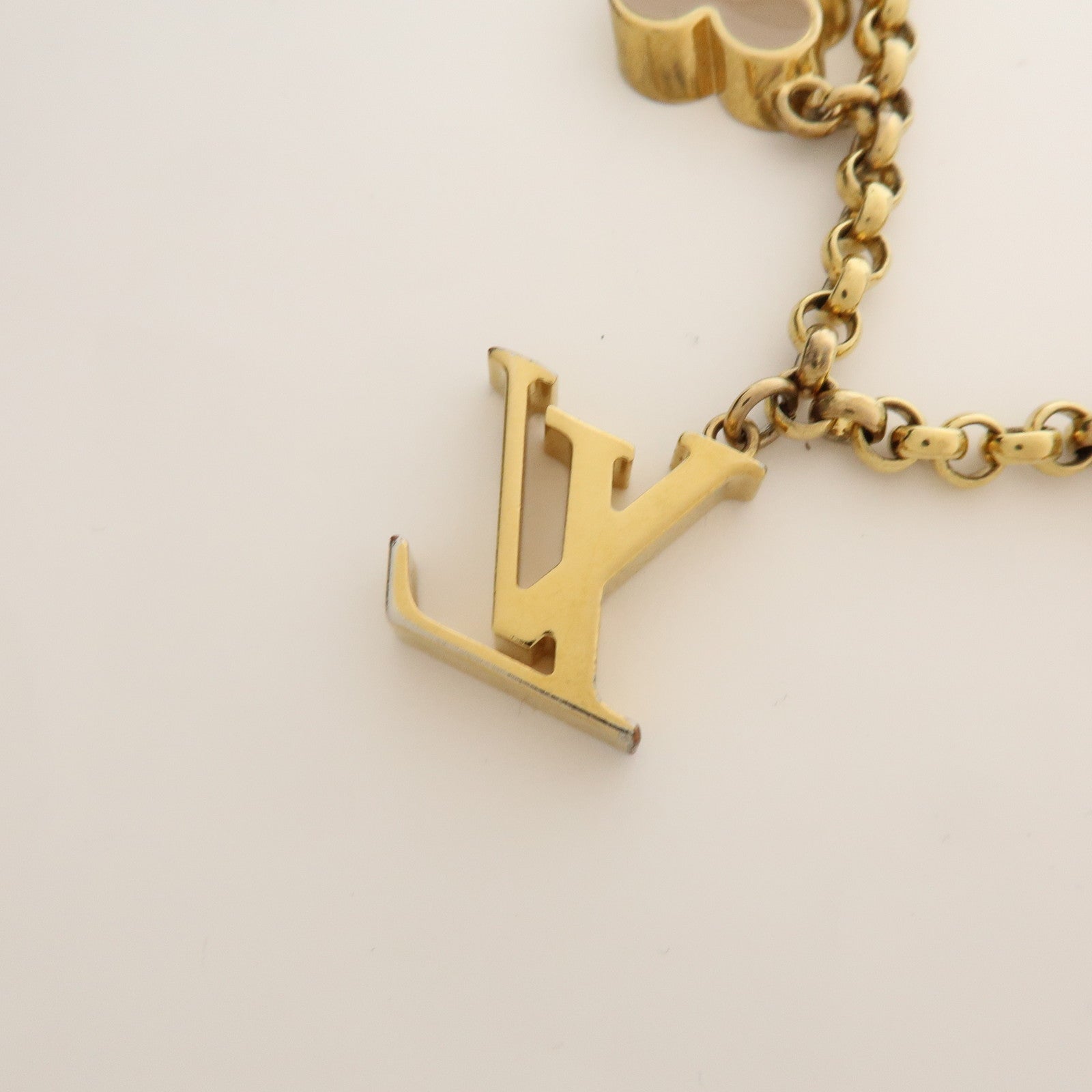 Louis Vuitton Fleur de Monogram Bag Charm Key Chain Gold M65111