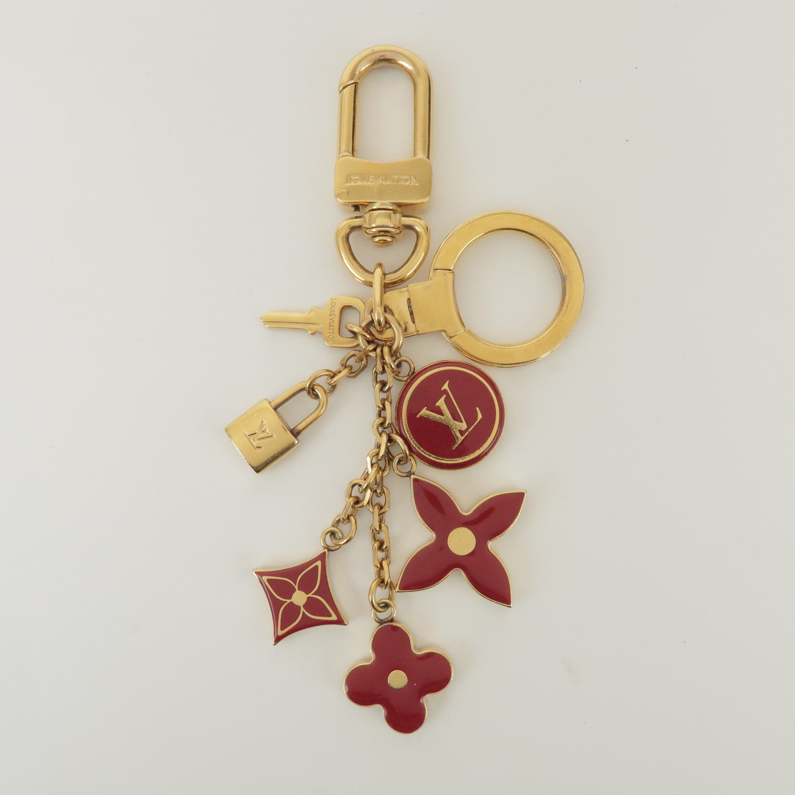 Louis Vuitton Porte Cles Pompille Metal Bag Charm Gold Red M91928