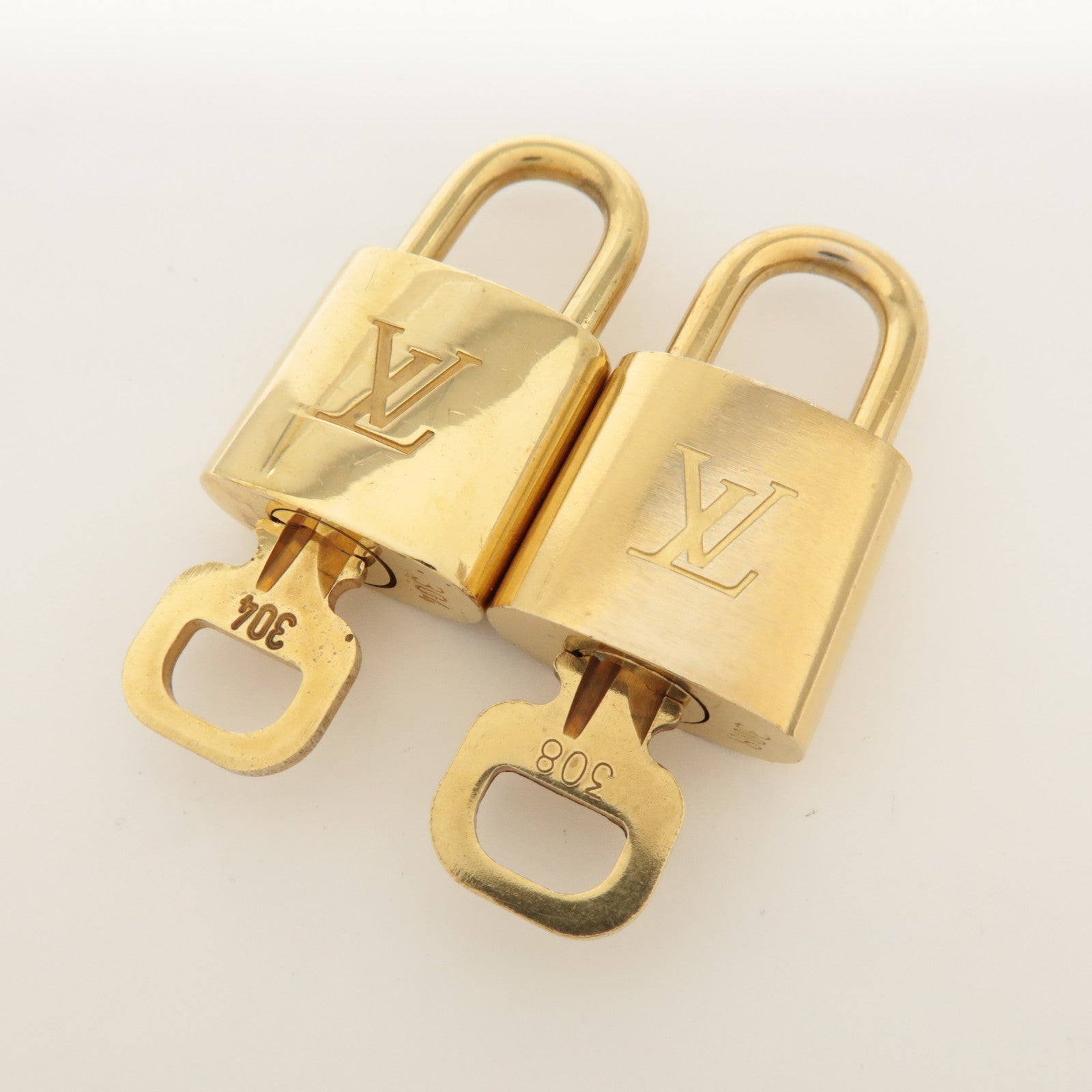 Louis Vuitton Set of 10 Lock & Key Cadena Key Lock Metal Gold