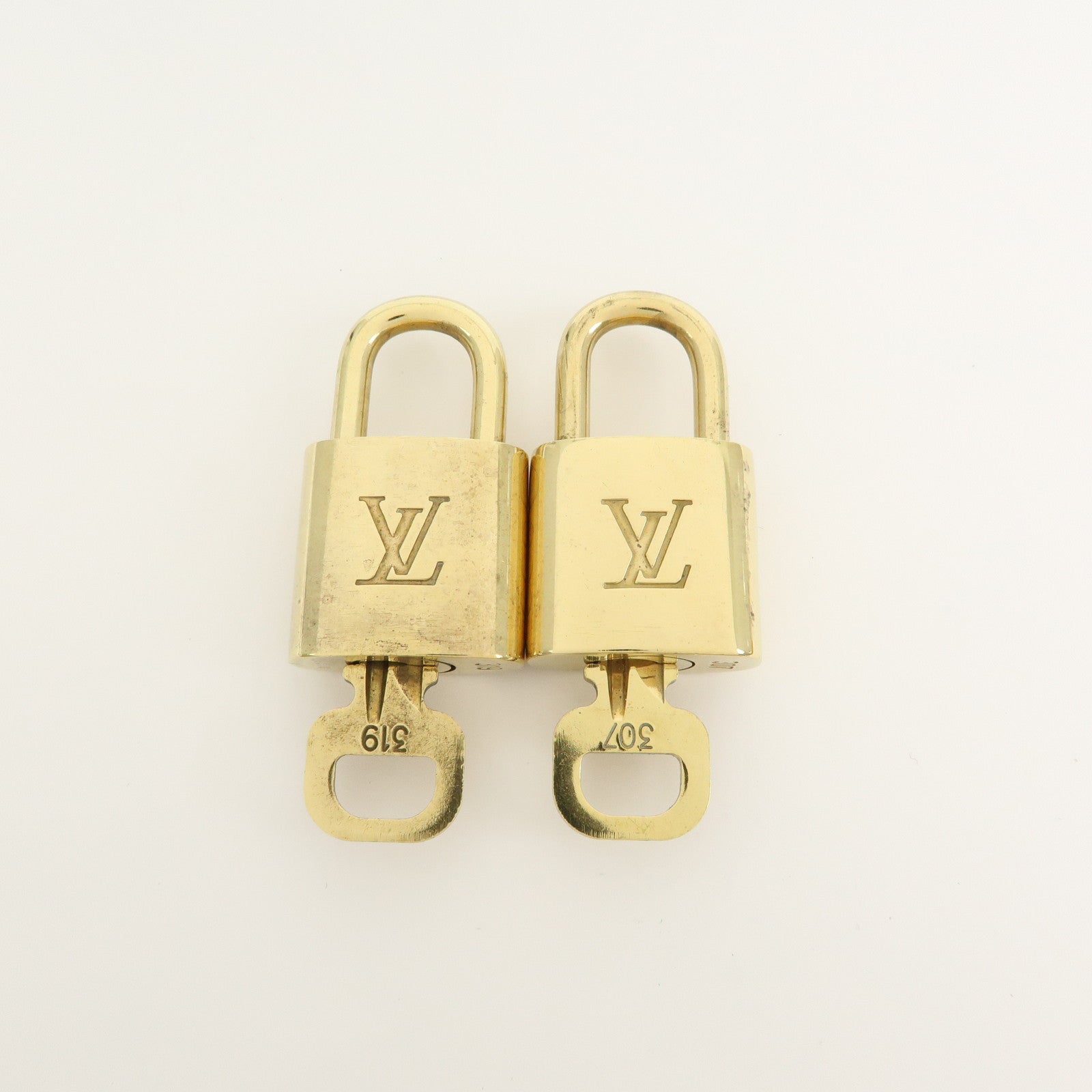 Louis Vuitton Set of 10 Lock & Key Cadena Key Lock Gold