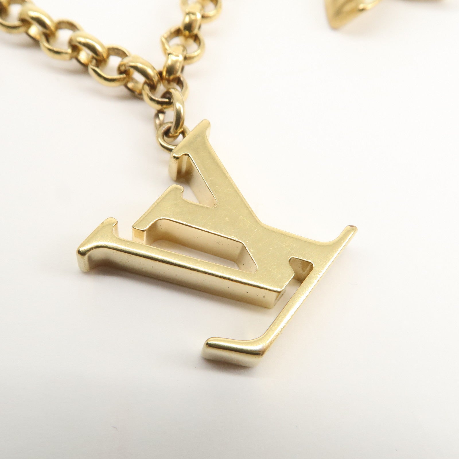 Louis Vuitton Fleur de Monogram Bag Charm Key Chain Gold M65111