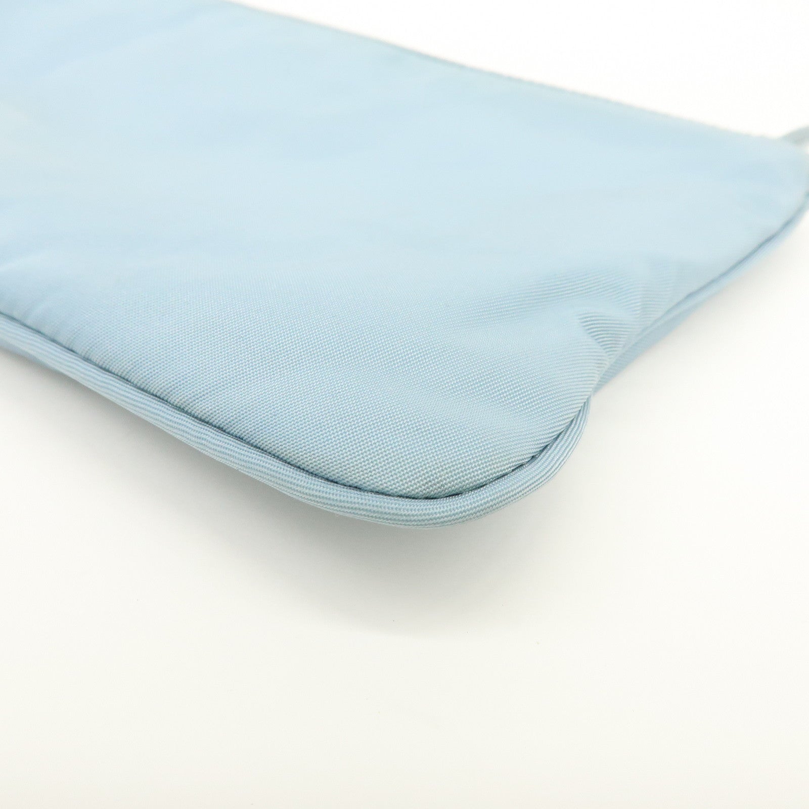 PRADA Triangle Logo TESSUTO IMPUNTU Nylon Pouch Light Blue 1NH545