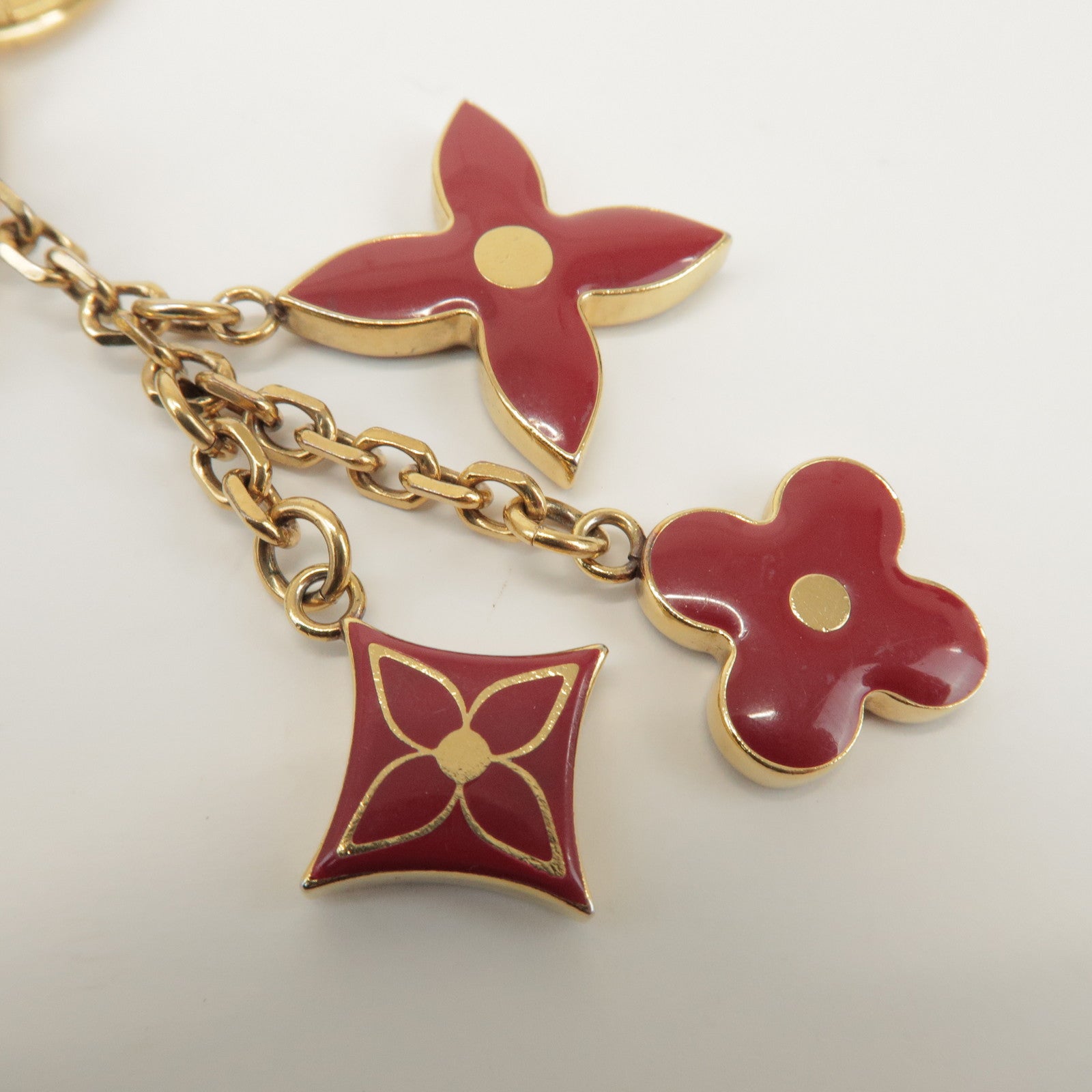 Louis Vuitton Porte Cles Pompille Metal Bag Charm Gold Red M91928
