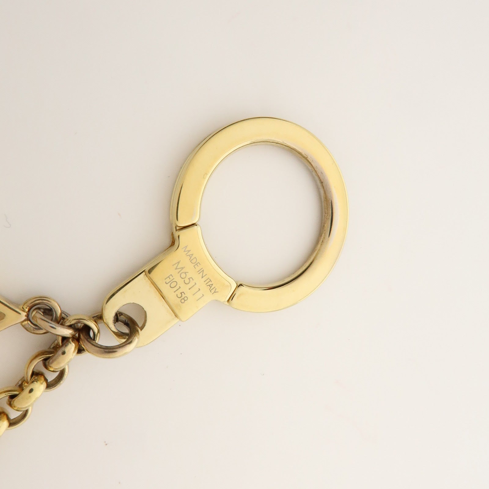 Louis Vuitton Fleur de Monogram Bag Charm Key Chain Gold M65111