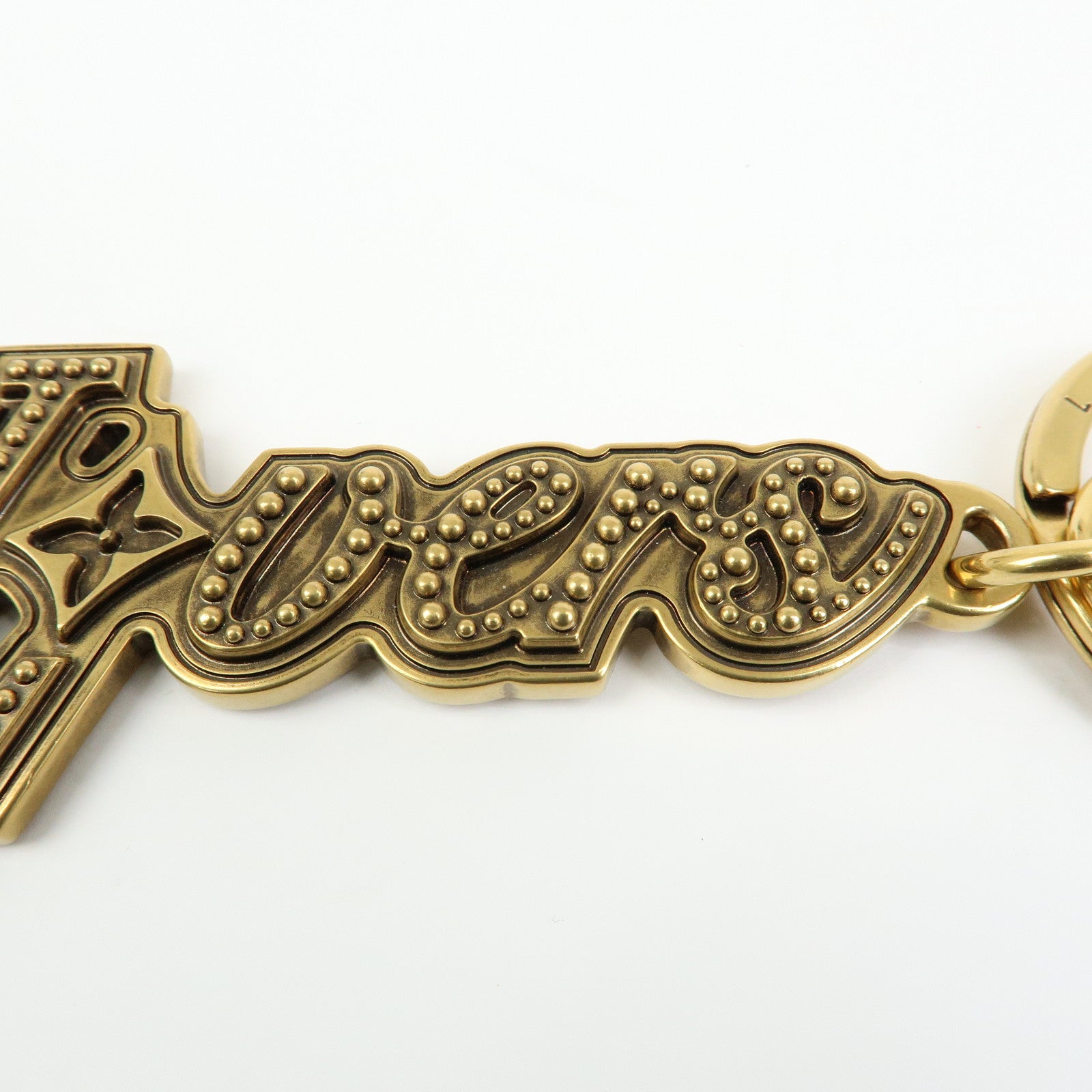 Louis Vuitton LV Lovers Studs Metal Bag Charm Key Chain Gold M01755