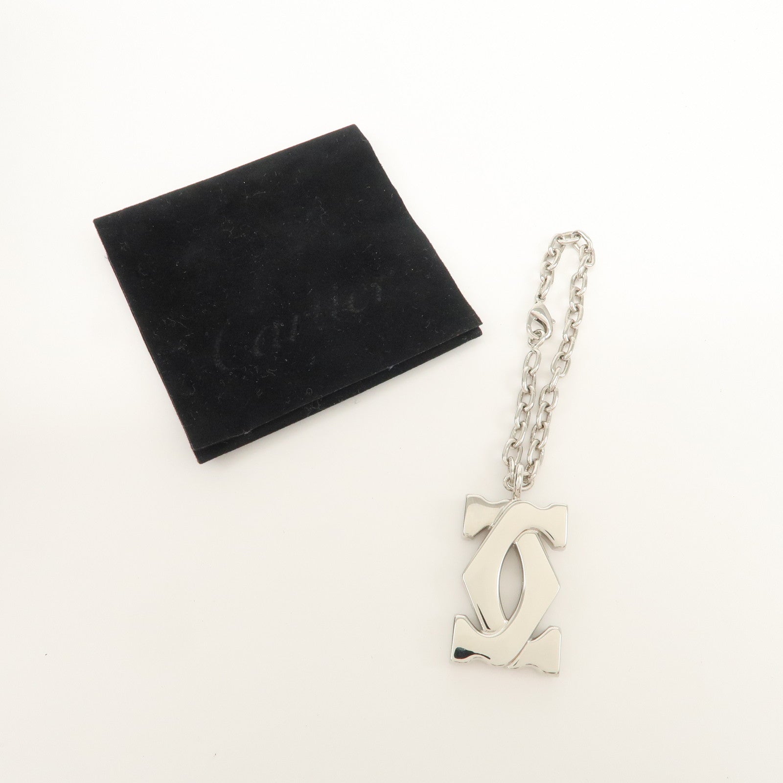 Cartier Must Line Logo Metal Bag Charm Key Charm Silver