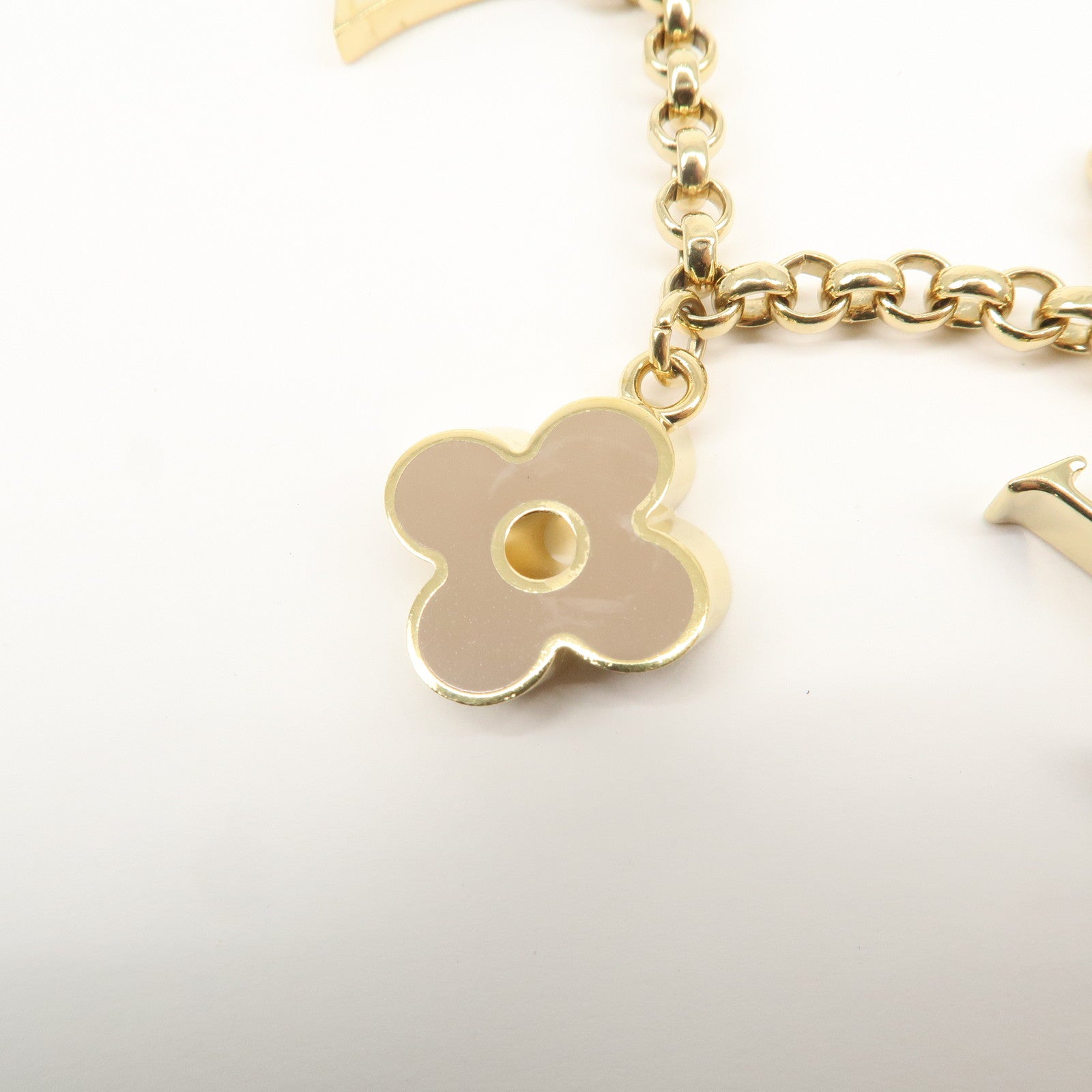 Louis Vuitton Fleur de Monogram Bag Charm Key Chain Gold M65111