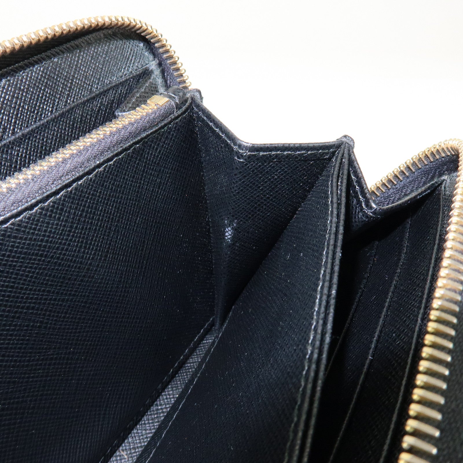 PRADA Saffiano Leather Ribbon Round Zippy Wallet Black 1M0506