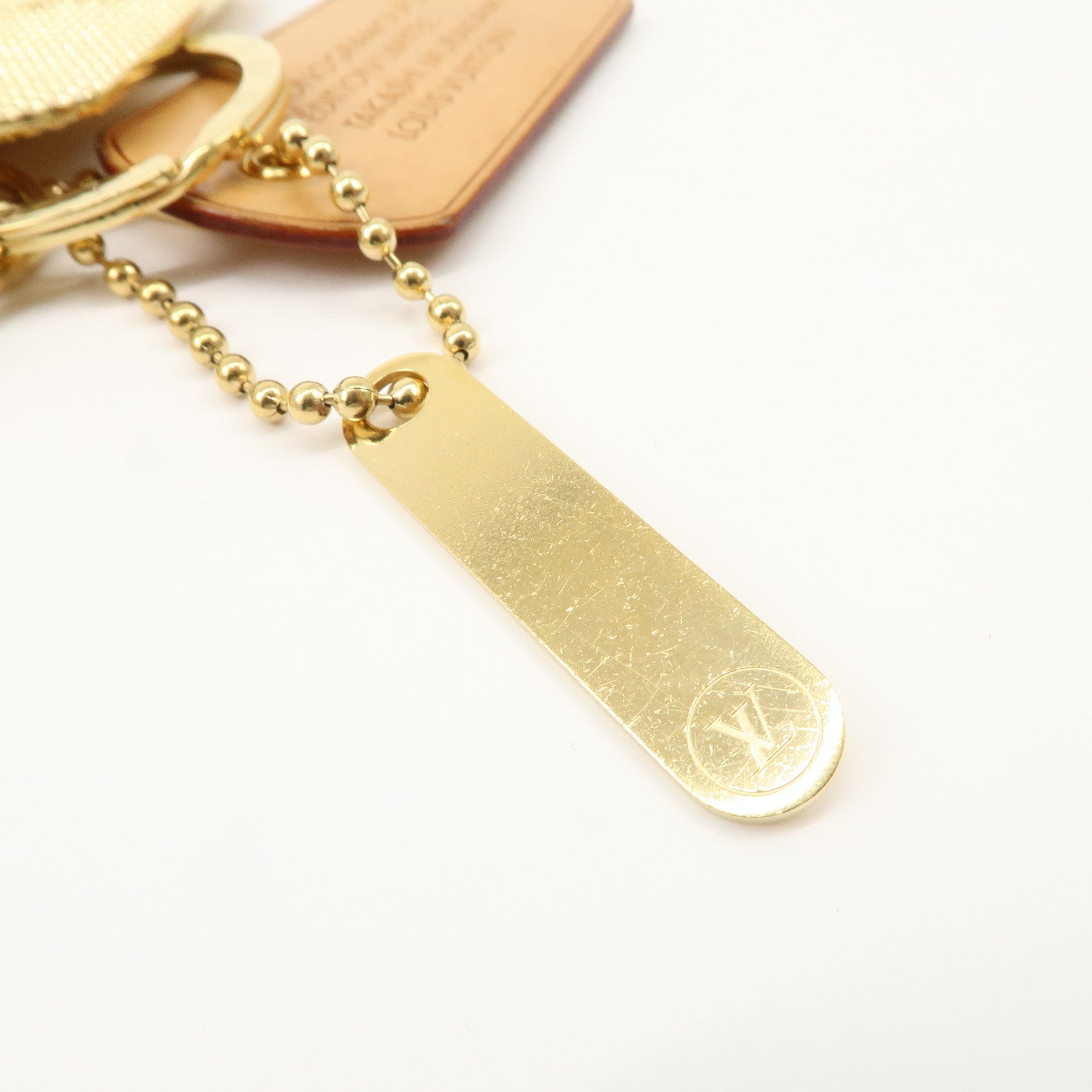 Louis Vuitton Bijoux Sac Monogram Flage Metal Resin Bag Charm Gold Rouge M65635 Used