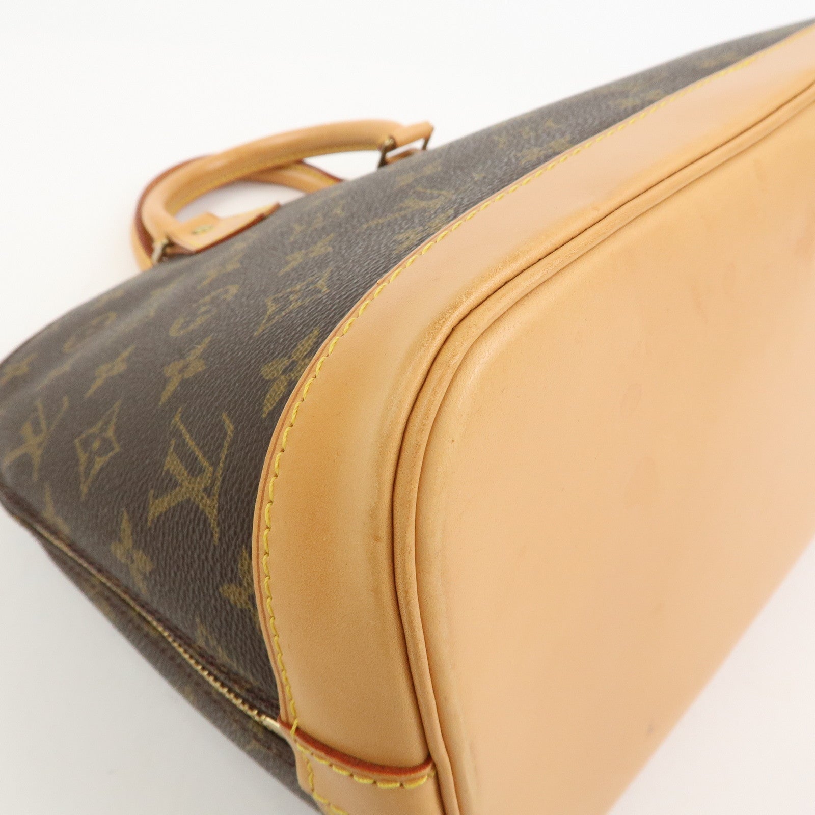 Louis Vuitton Monogram Alma Hand Bag Brown M51130