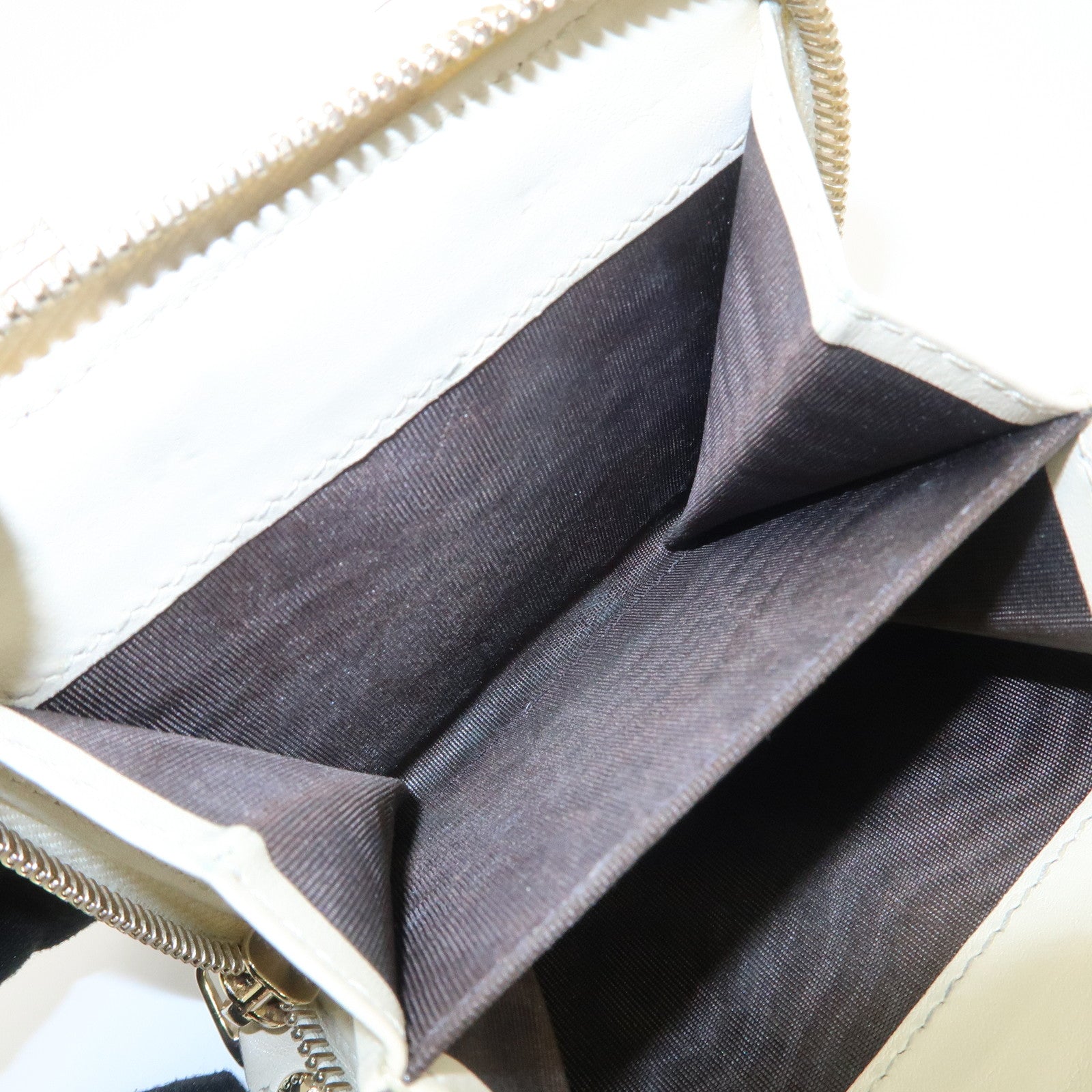 GUCCI Micro Guccissima Signature Bi-Fold Compact Wallet 449395