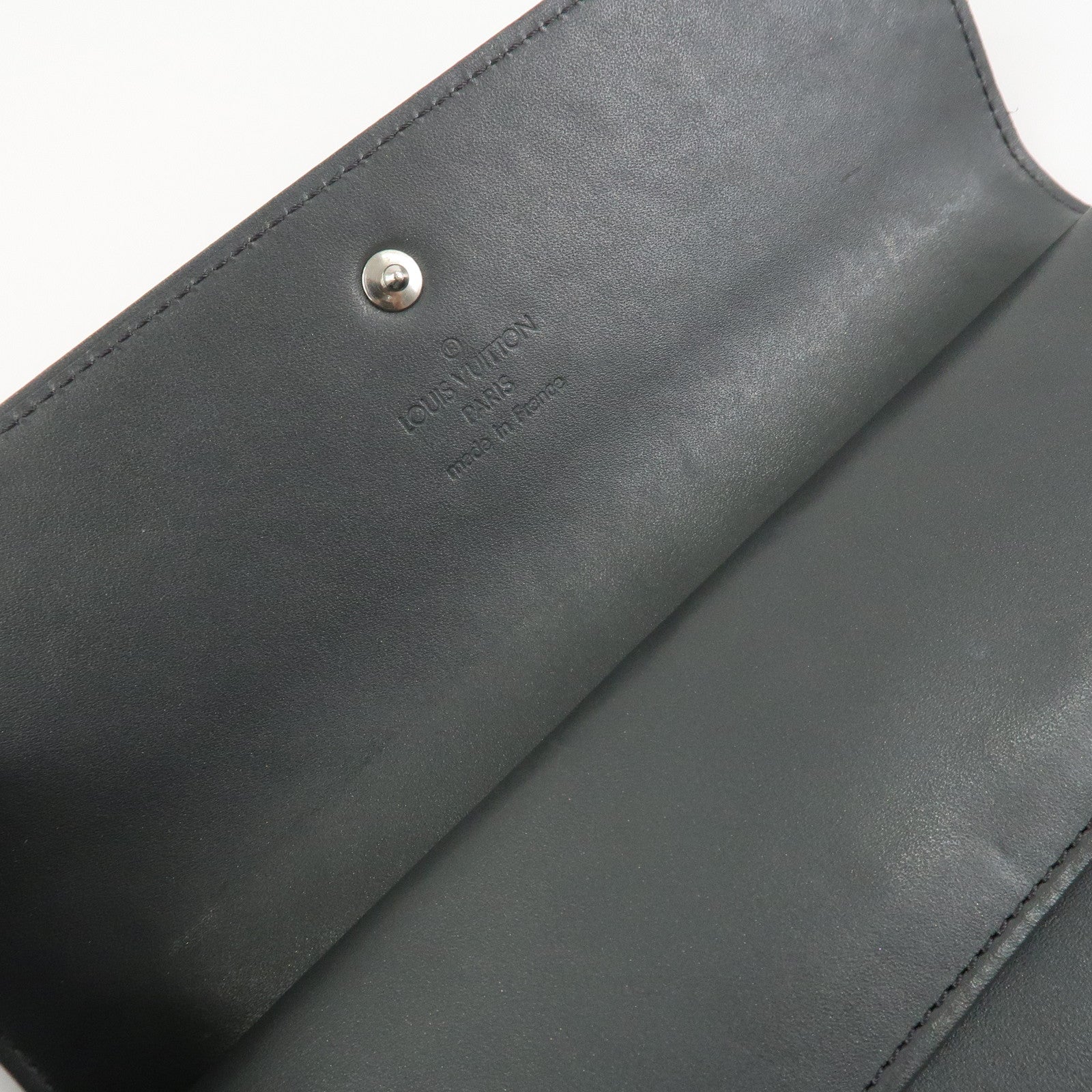 Louis Vuitton Monogram Matte Porto Tresor International M65102