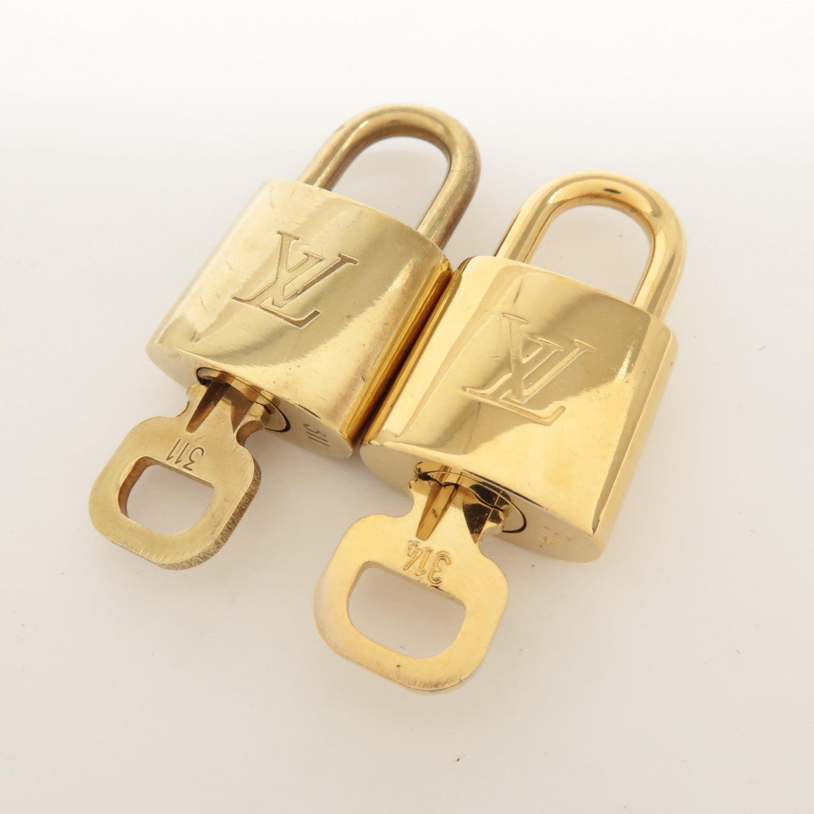 Louis Vuitton Set of 10 Lock & Key Cadena Key Lock Metal Gold