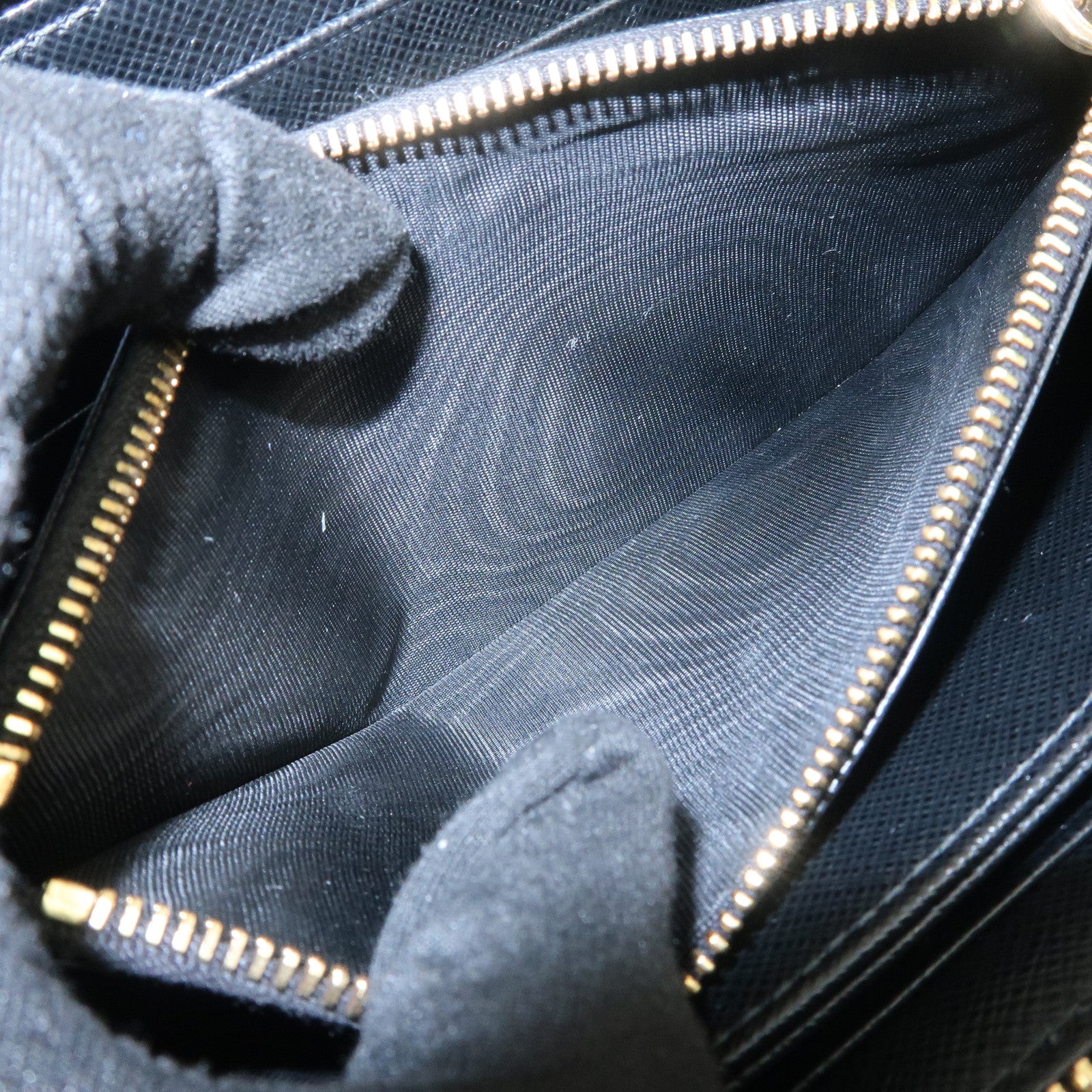 PRADA Logo Saffiano Leather Round Zippy Long Wallet Black