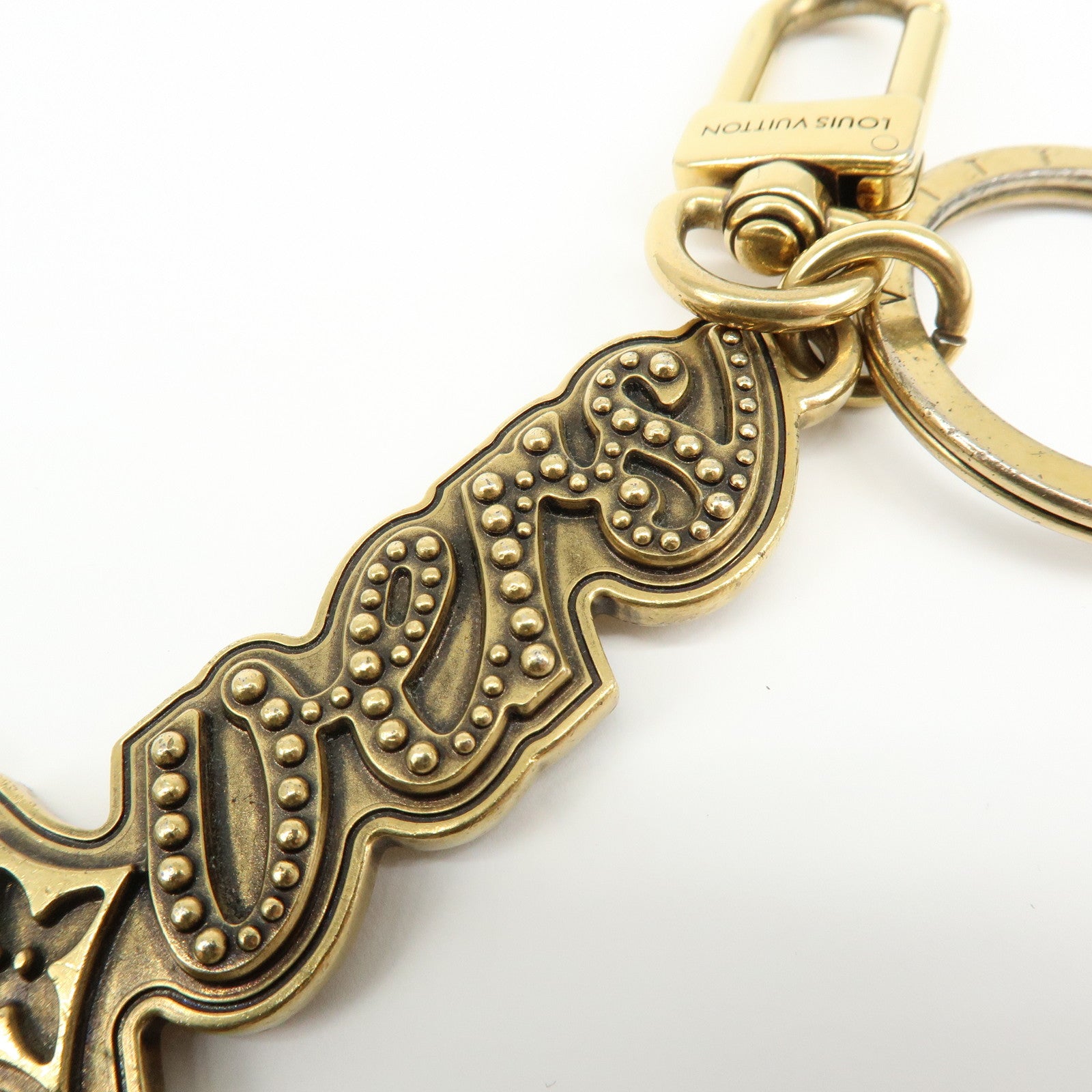 Louis Vuitton LV Lovers Studs Metal Bag Charm Key Chain Gold M01755