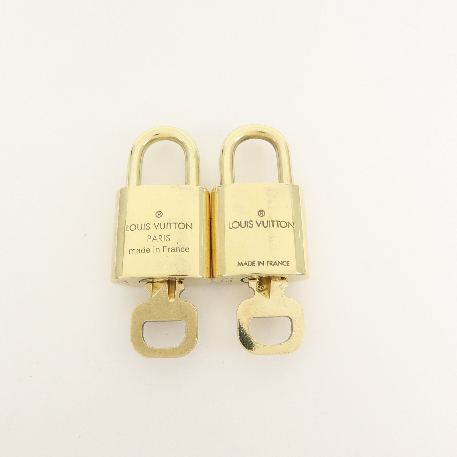 Louis Vuitton Set of 10 Lock & Key Cadena Key Lock Gold