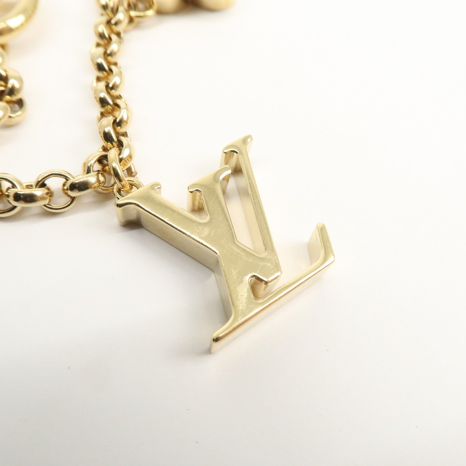Louis Vuitton Fleur de Monogram Bag Charm Key Chain Gold M65111