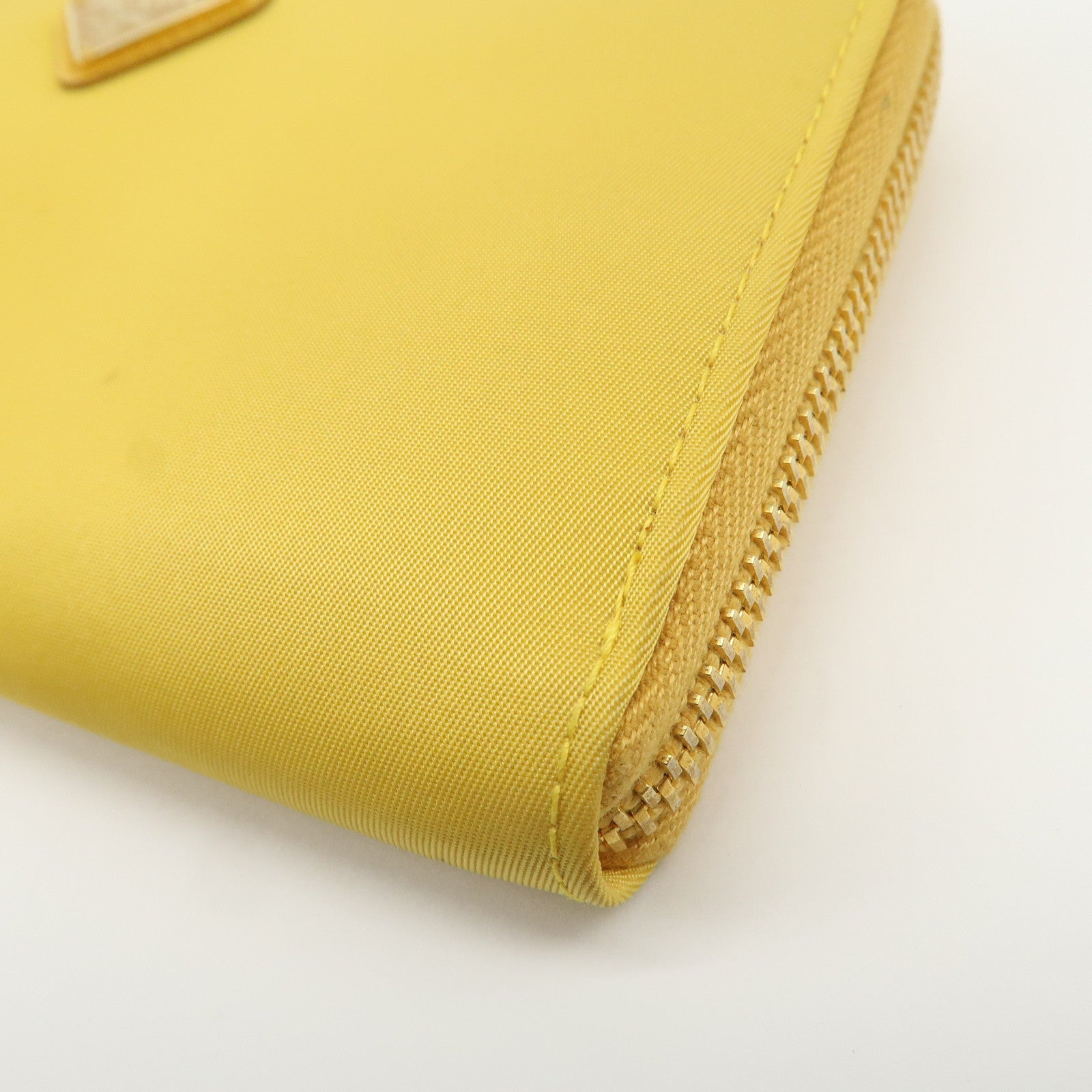 PRADA Triangle Logo Nylon Leather Round Zippy Long Wallet Yellow