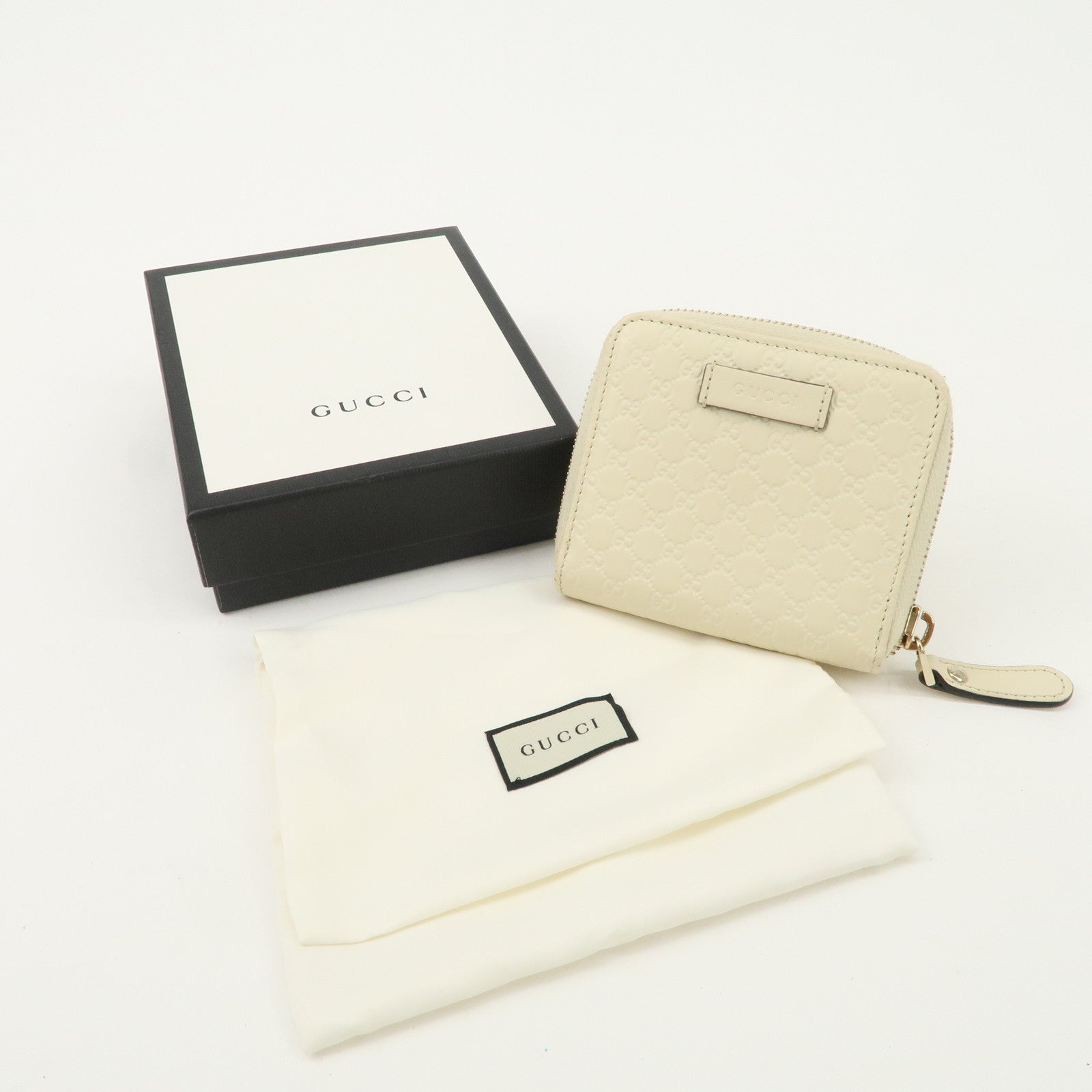 GUCCI Micro Guccissima Leather Signature Bi-Fold Compact Wallet Ivory Used