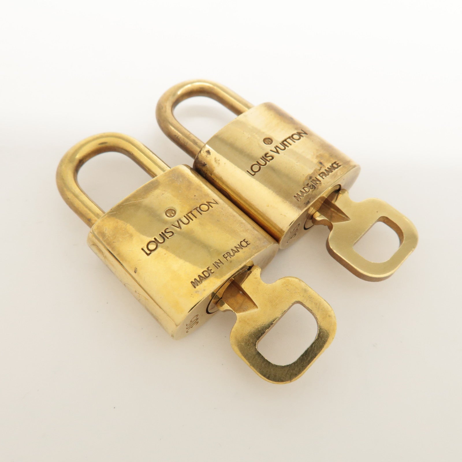 Louis Vuitton Set of 10 Lock & Key Cadena Key Lock Metal Gold