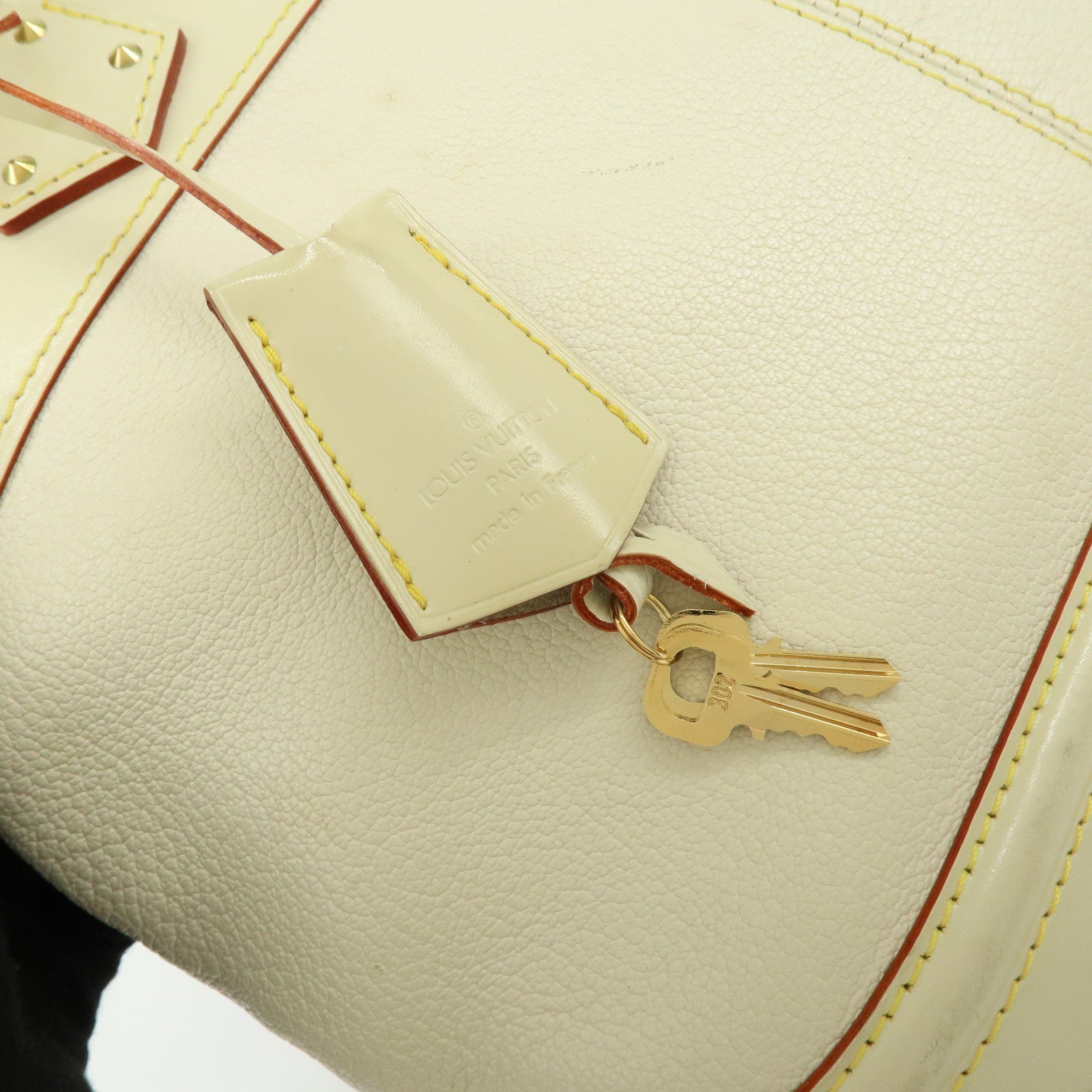 Louis Vuitton Suhari Lock It PM Hand Bag Blanc M91887
