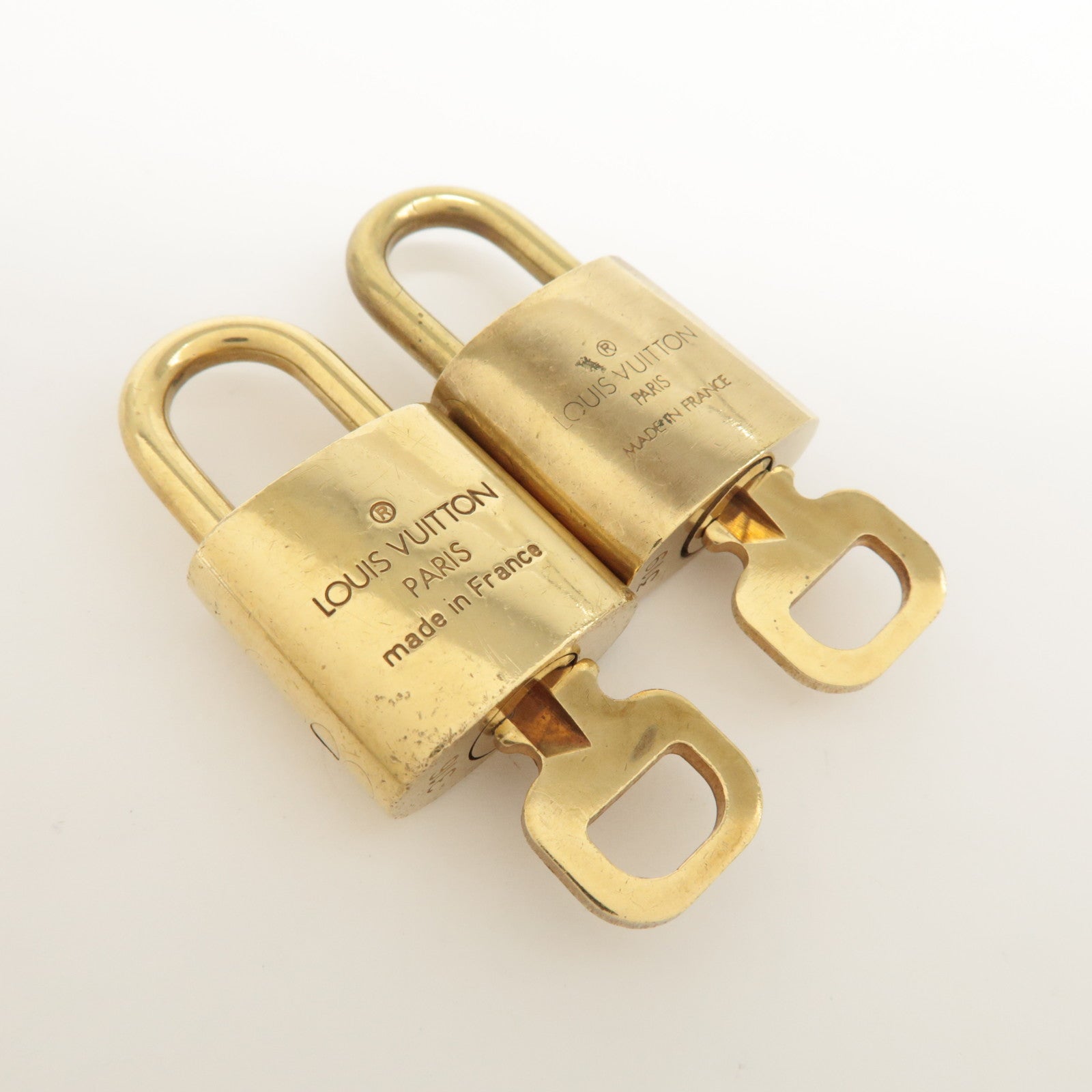 Louis Vuitton Set of 10 Lock & Key Cadena Key Lock Metal Gold