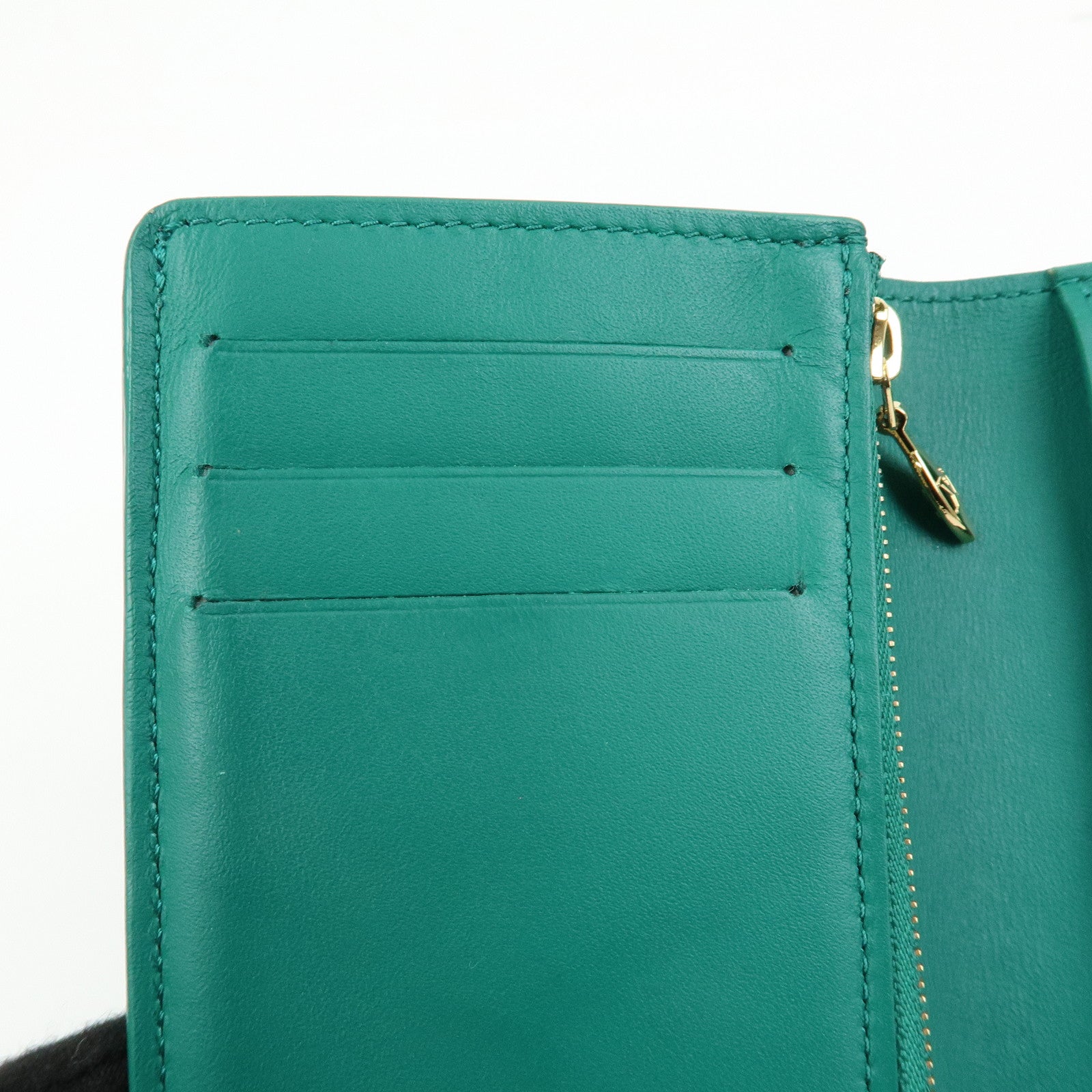 Louis Vuitton Taurillon Leather Vertical Compact Wallet M82438