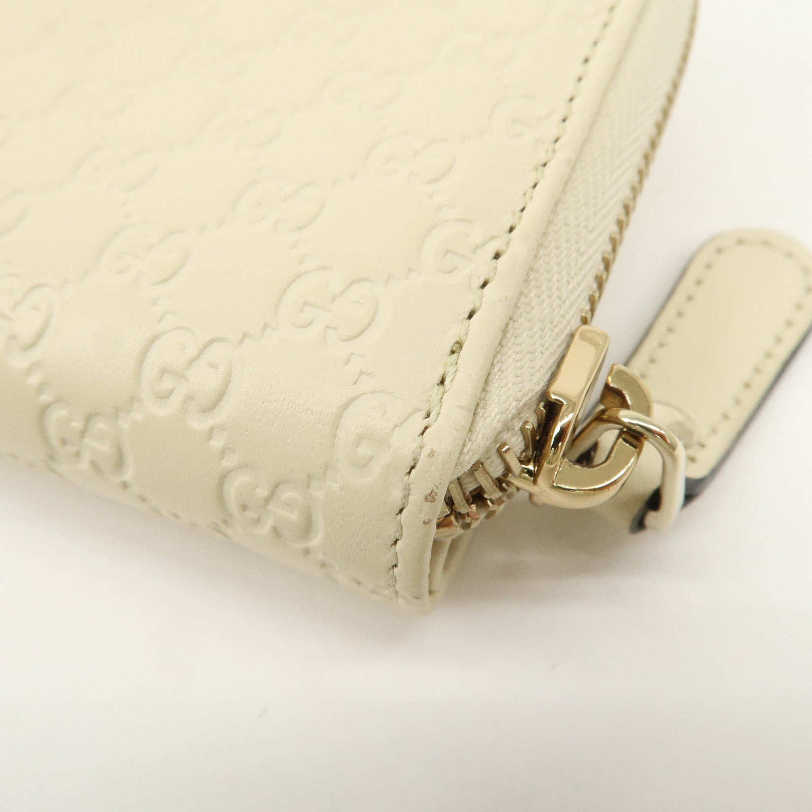 GUCCI Micro Guccissima Leather Signature Bi-Fold Compact Wallet Ivory Used