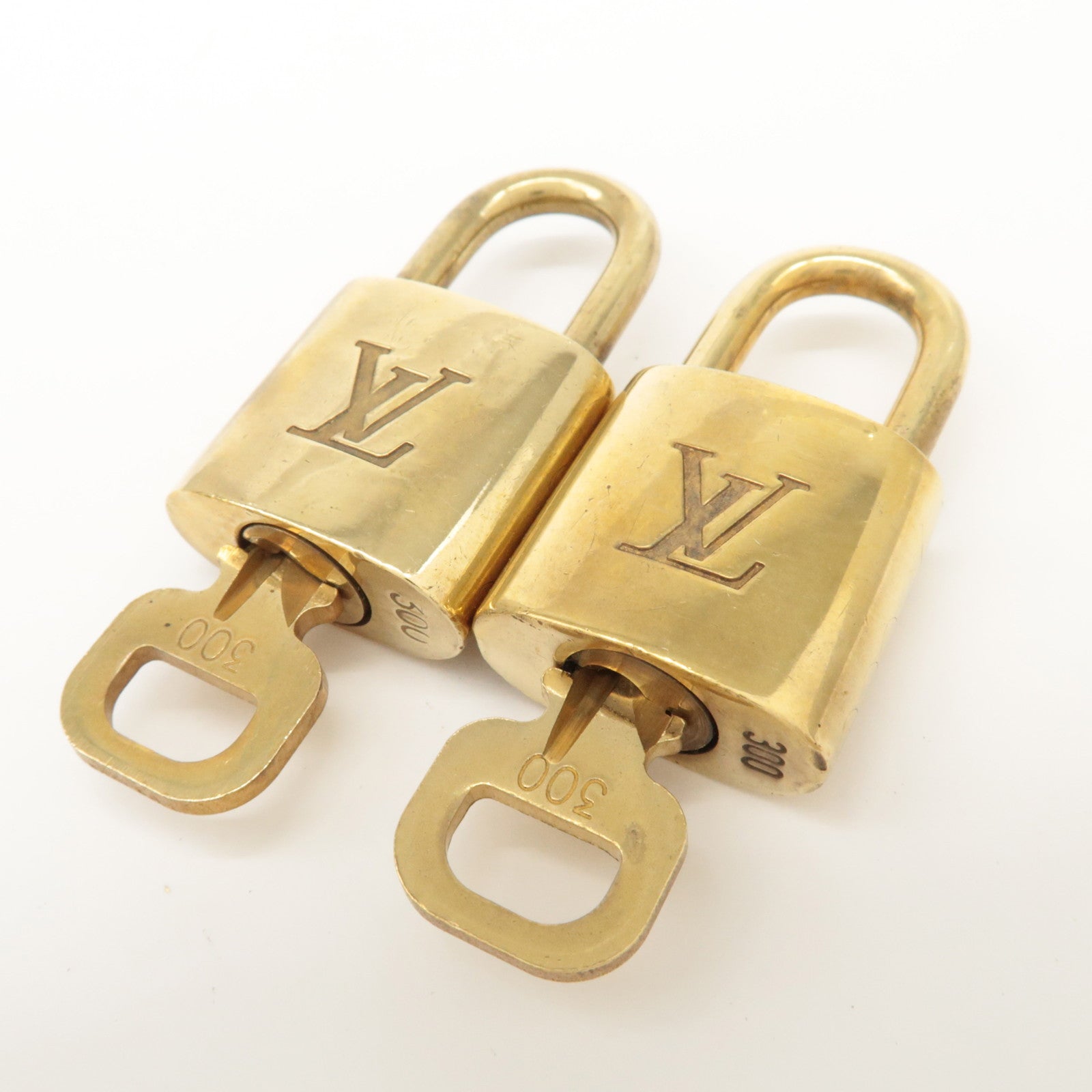 Louis Vuitton Set of 10 Lock & Key Cadena Key Lock Metal Gold