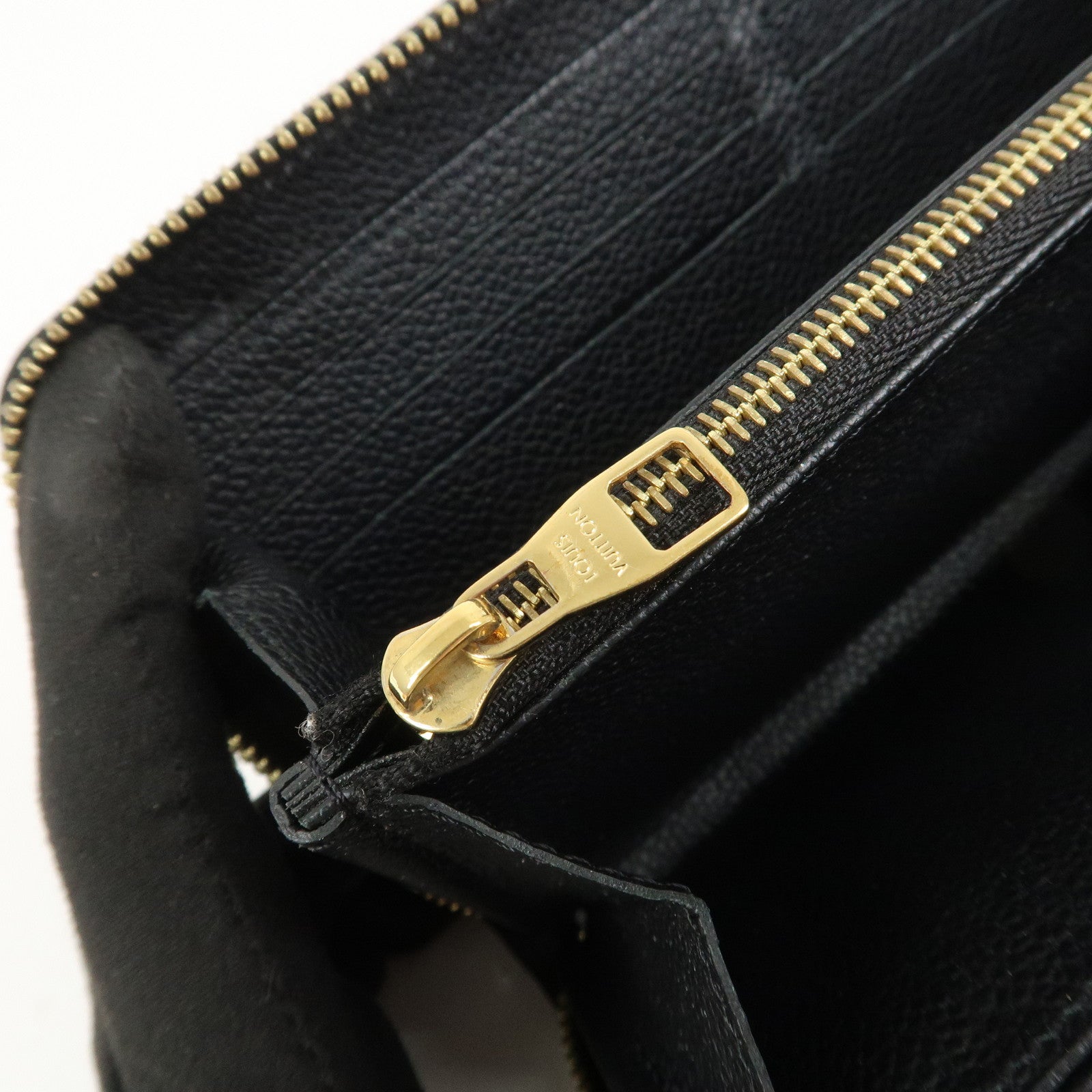 Louis Vuitton Monogram Empreinte Leather Round Zippy Wallet M61864