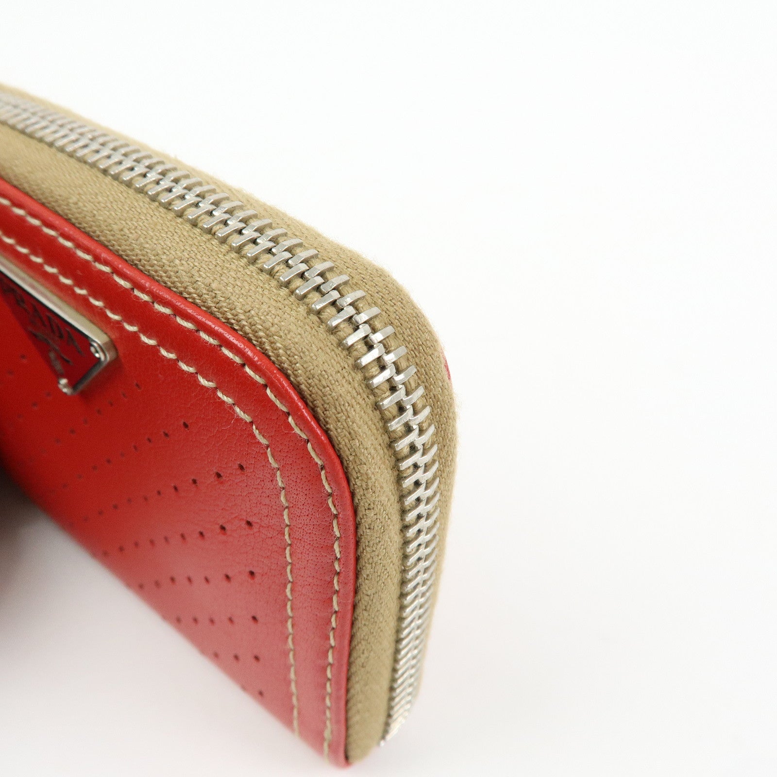 PRADA Triangle Logo Punched Leather Round Zippy Coin Case Red