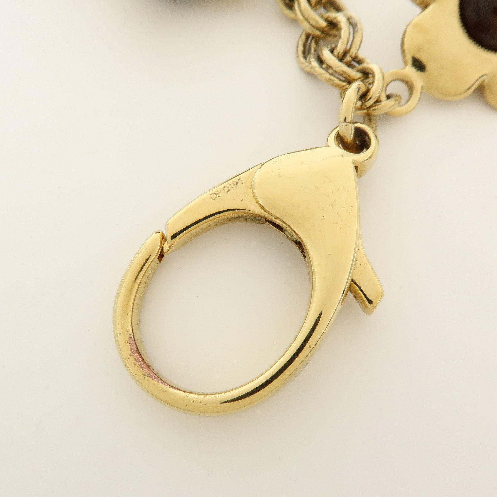 Louis Vuitton Metal Bijou Sac Tresor Bag Charm Gold Brown M66349