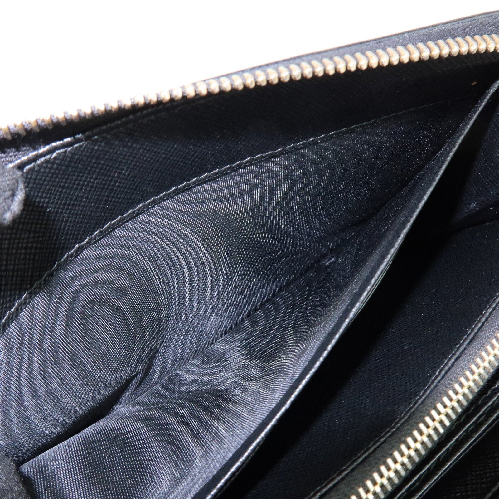 PRADA Saffiano Leather Ribbon Round Zippy Wallet Black 1M0506
