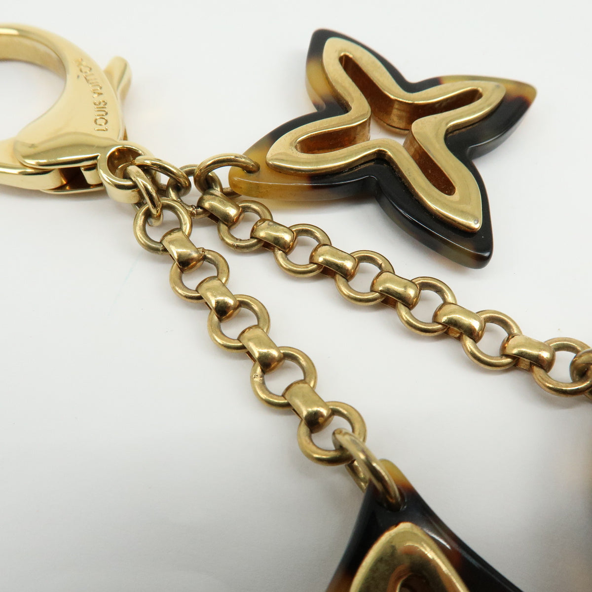 Louis Vuitton Bijou Sac Insolence Bag Charm Gold Brown M65844