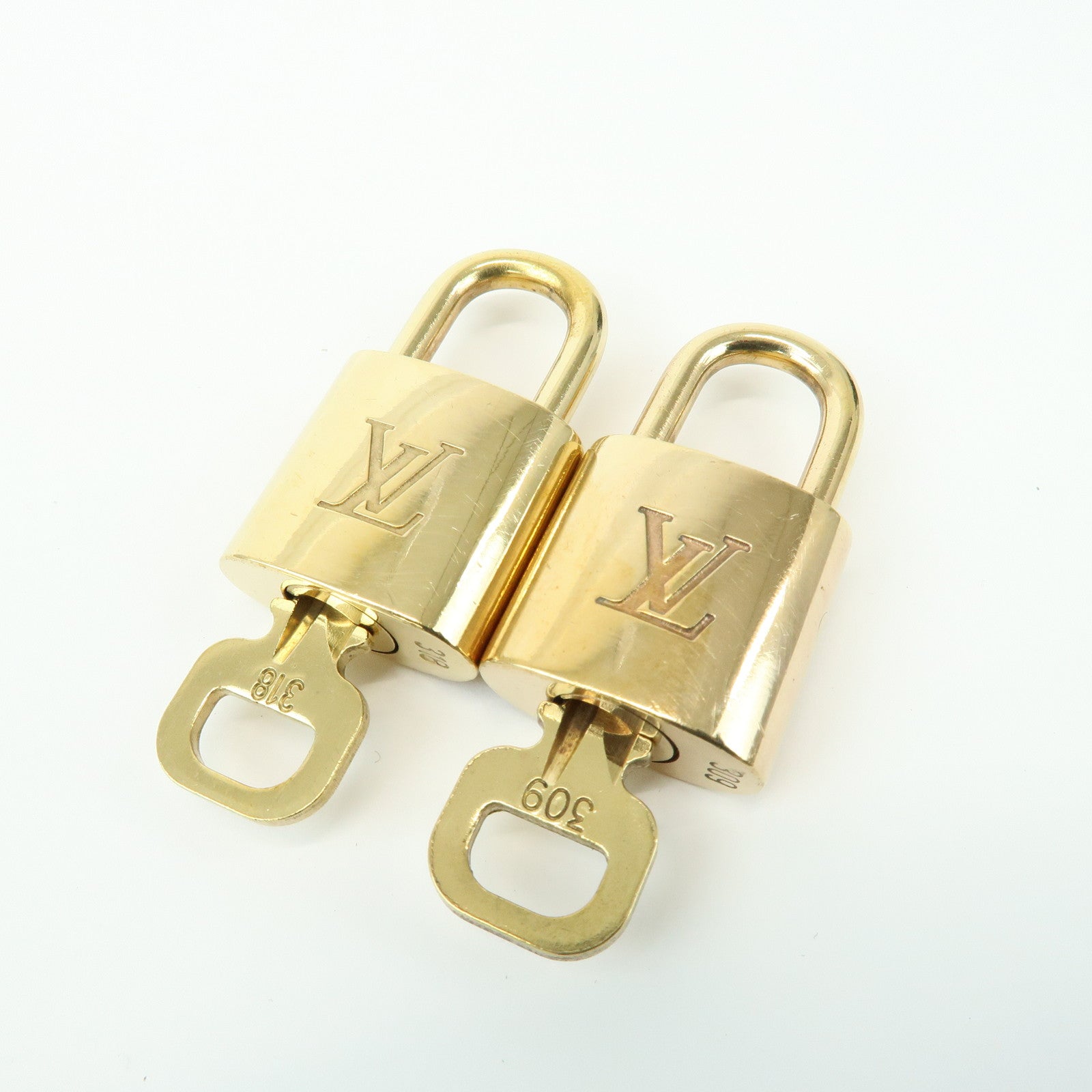 Louis Vuitton Set of 10 Lock & Key Cadena Key Lock