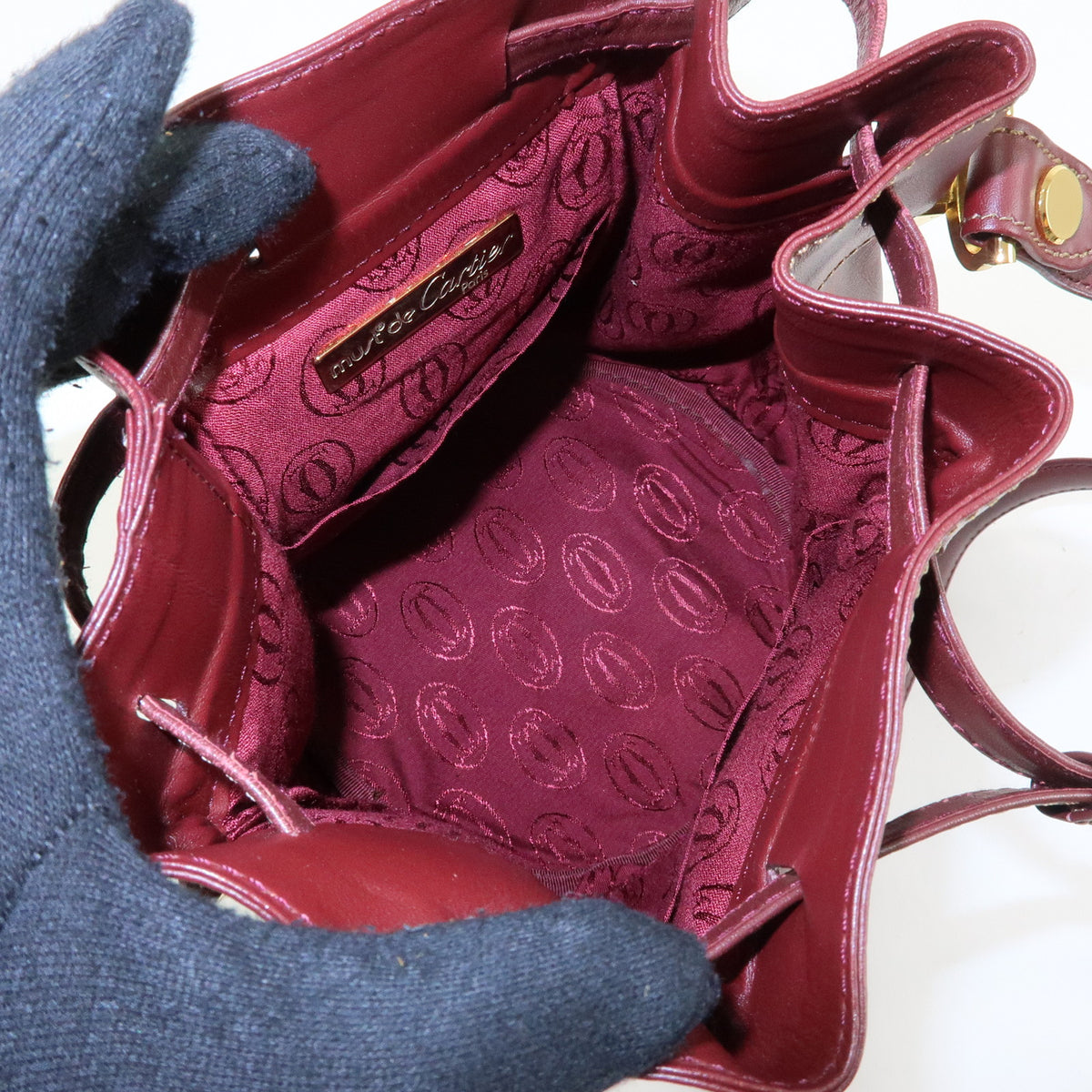 Cartier Must de Cartier Leather Drawstring Mini Shoulder Bag Bordeaux