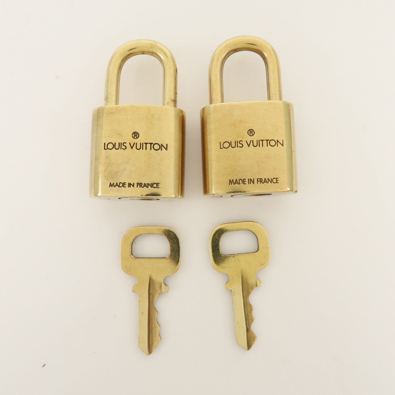 Louis Vuitton Set of 10 Metal Lock & Key Cadena Key Lock Gold