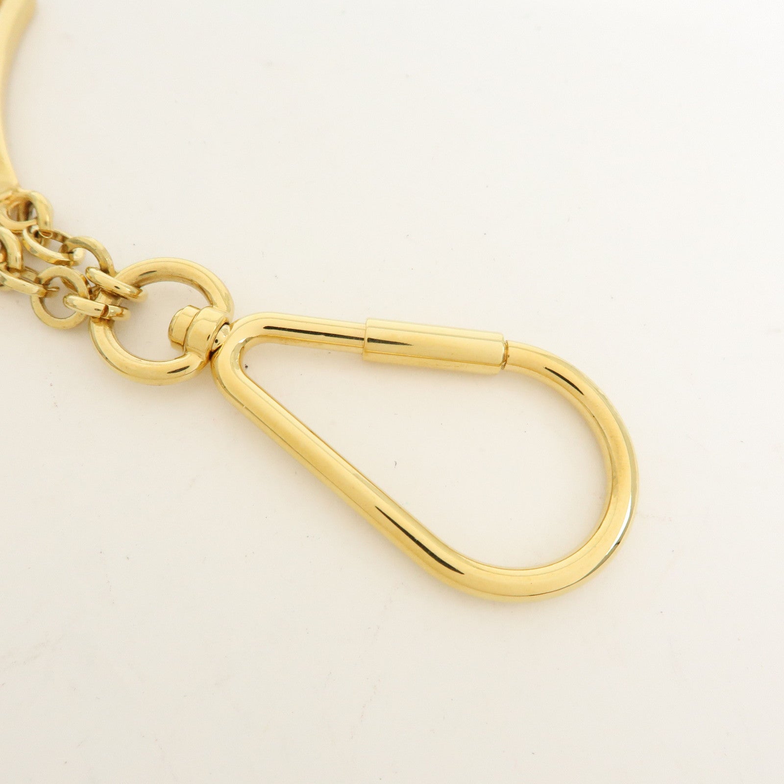 Louis Vuitton Porte Cles Puzzle Bag Charm Dark Brown Gold M65218