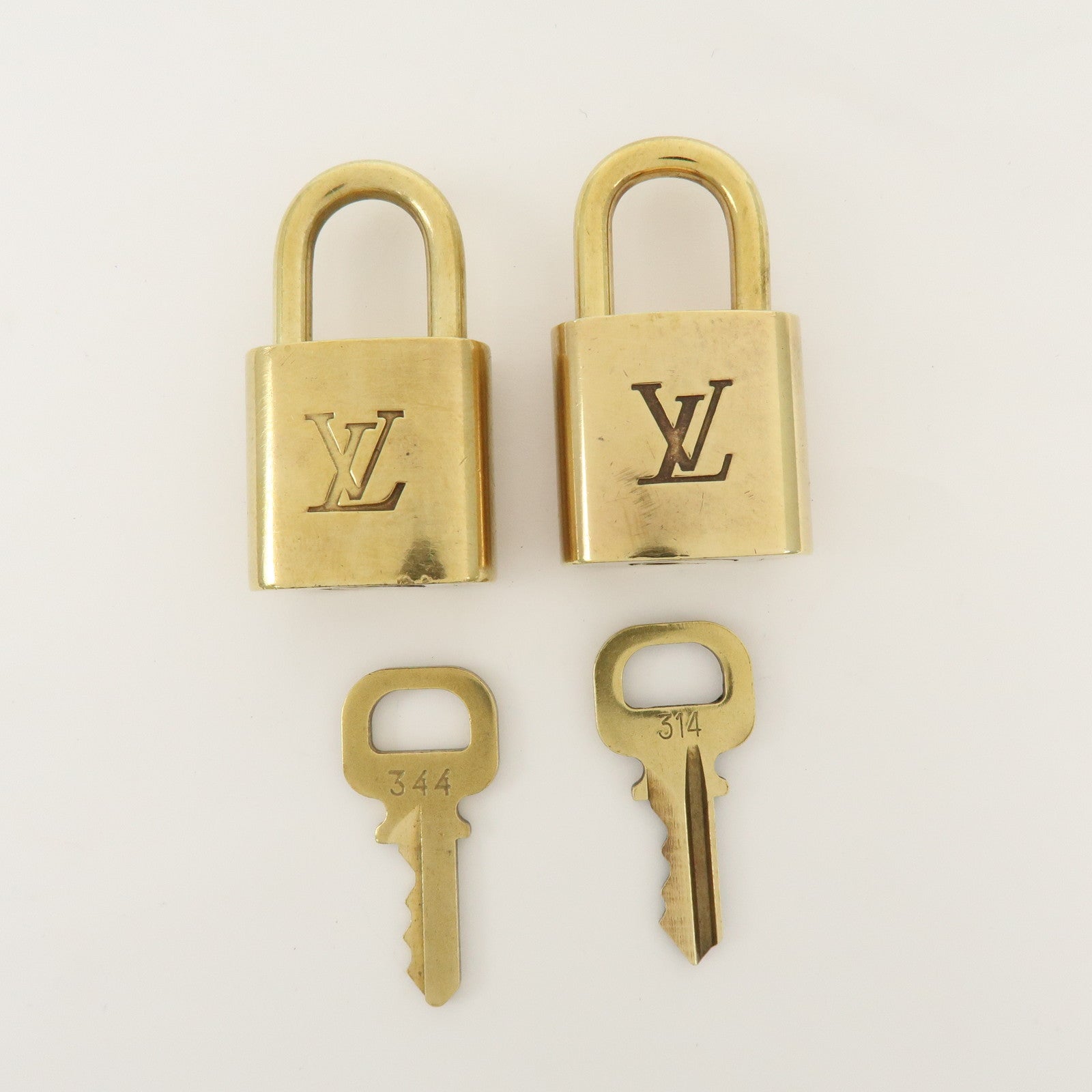 Louis Vuitton Set of 10 Metal Lock & Key Cadena Key Lock Gold