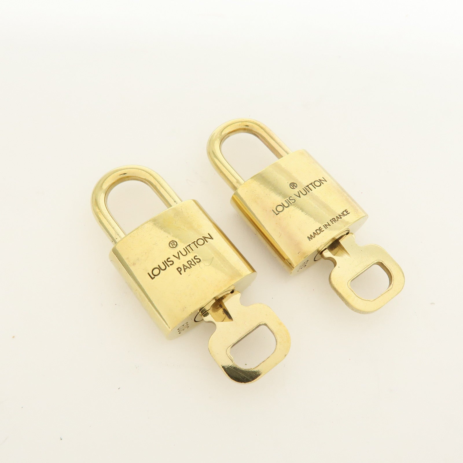 Louis Vuitton Lot of 10 Metal Lock & Key Cadena Key Lock Gold