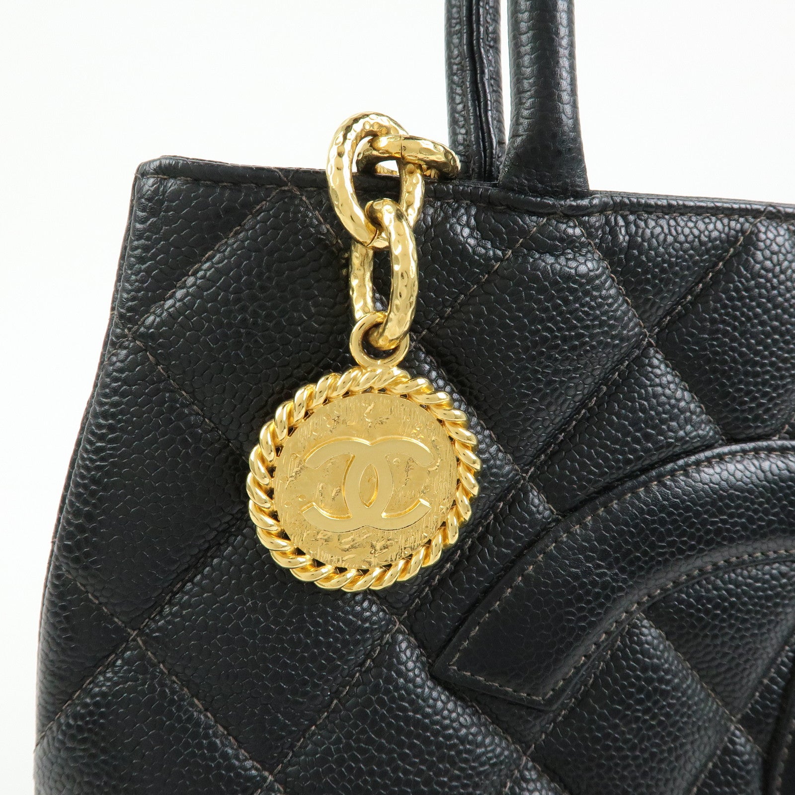 CHANEL Matelasse COCO Mark CaviarSkin Medallion Tote Bag Black A01804