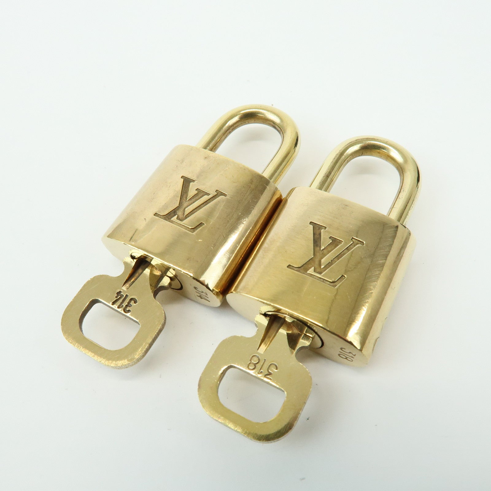 Louis Vuitton Set of 10 Lock & Key Cadena Key Lock