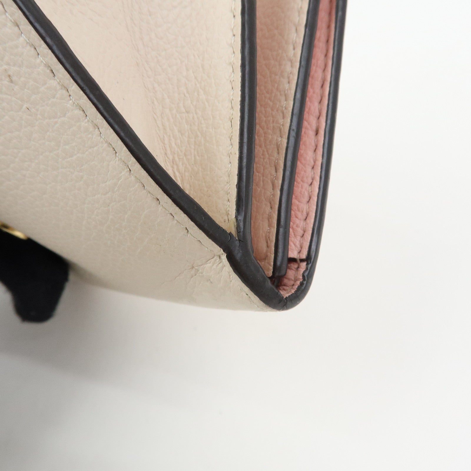 Louis Vuitton Portefeuille Lockmini Taurillon Compact Wallet M80785