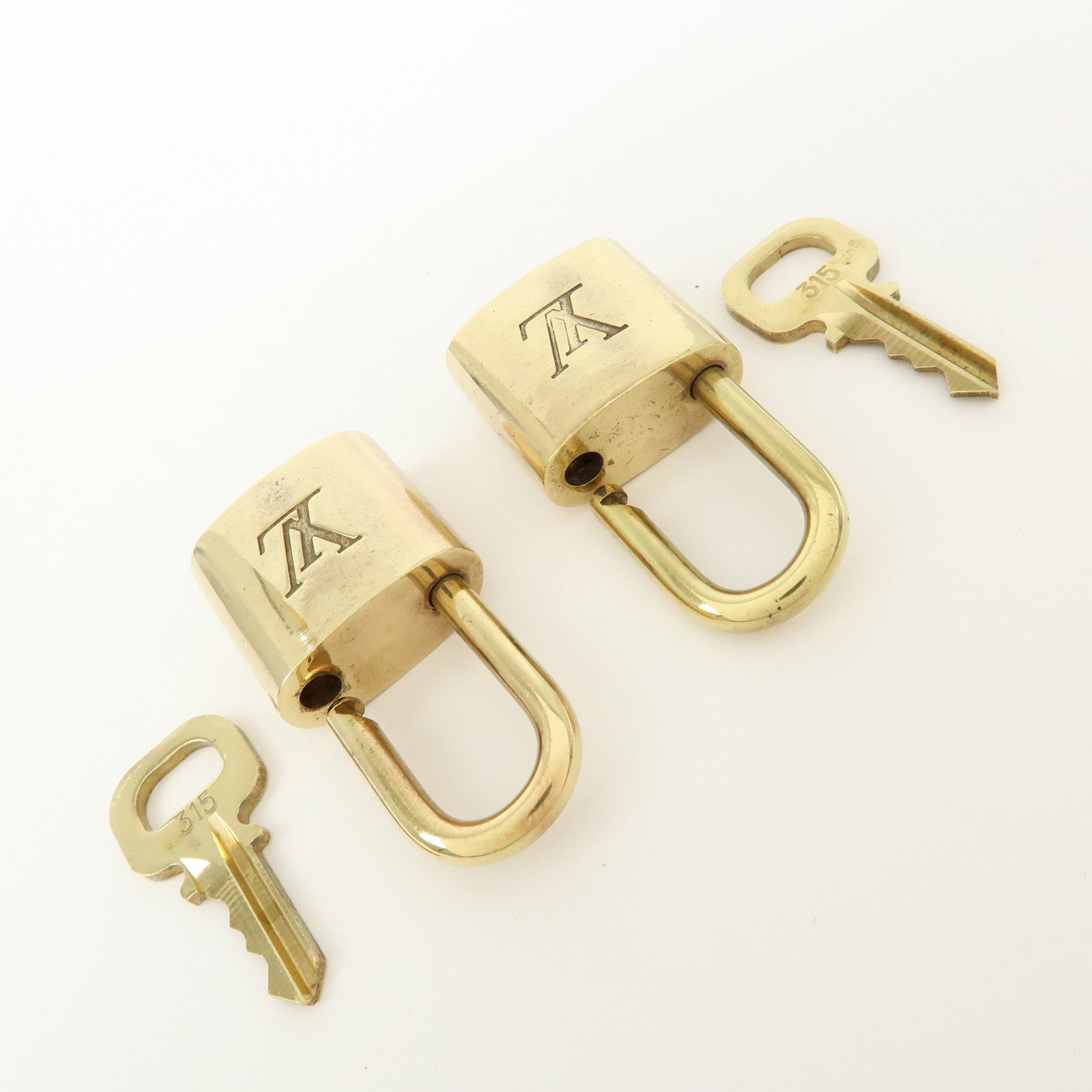 Louis Vuitton Set of 10 Lock & Key Cadena Key Lock Gold