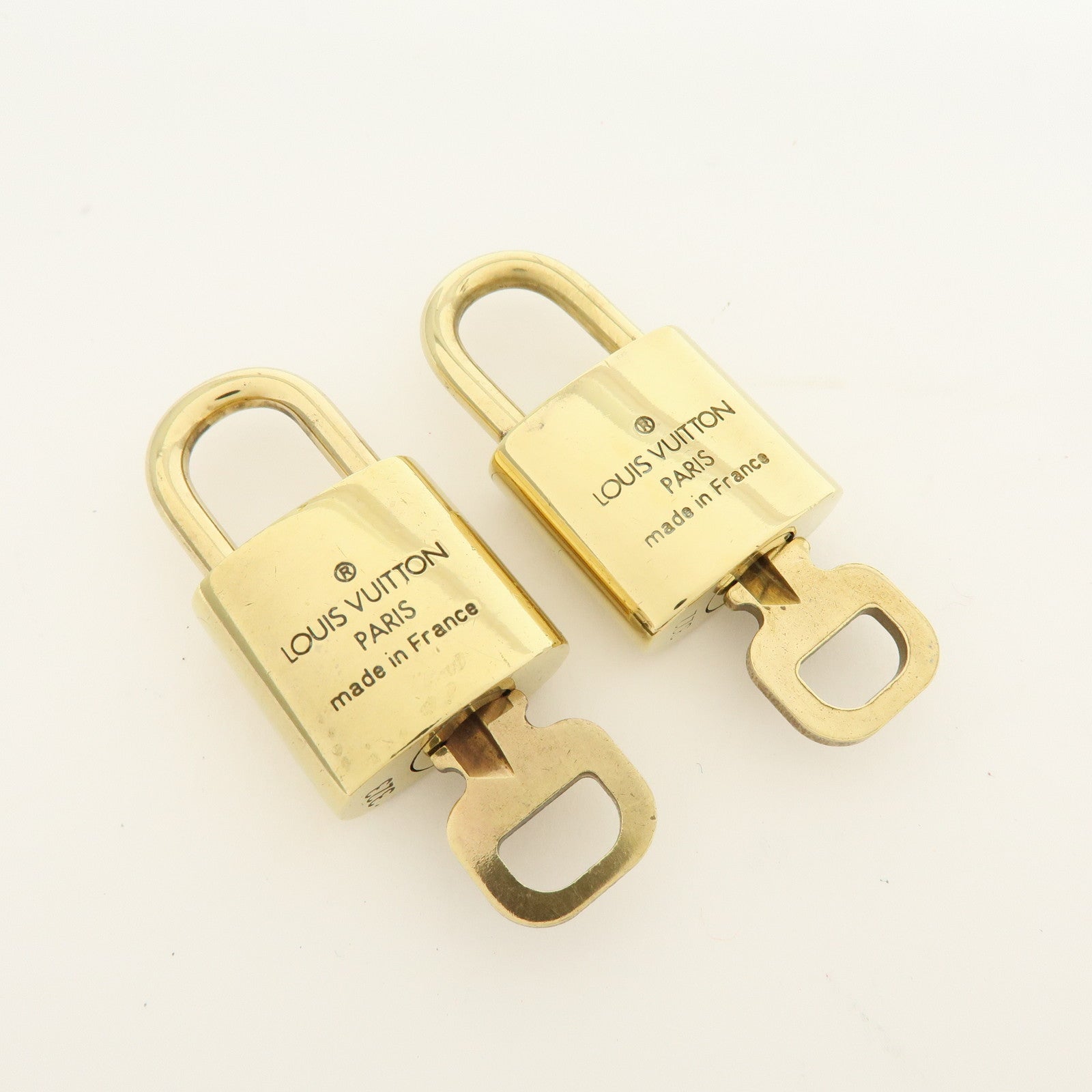 Louis Vuitton Lot of 10 Metal Lock & Key Cadena Key Lock Gold