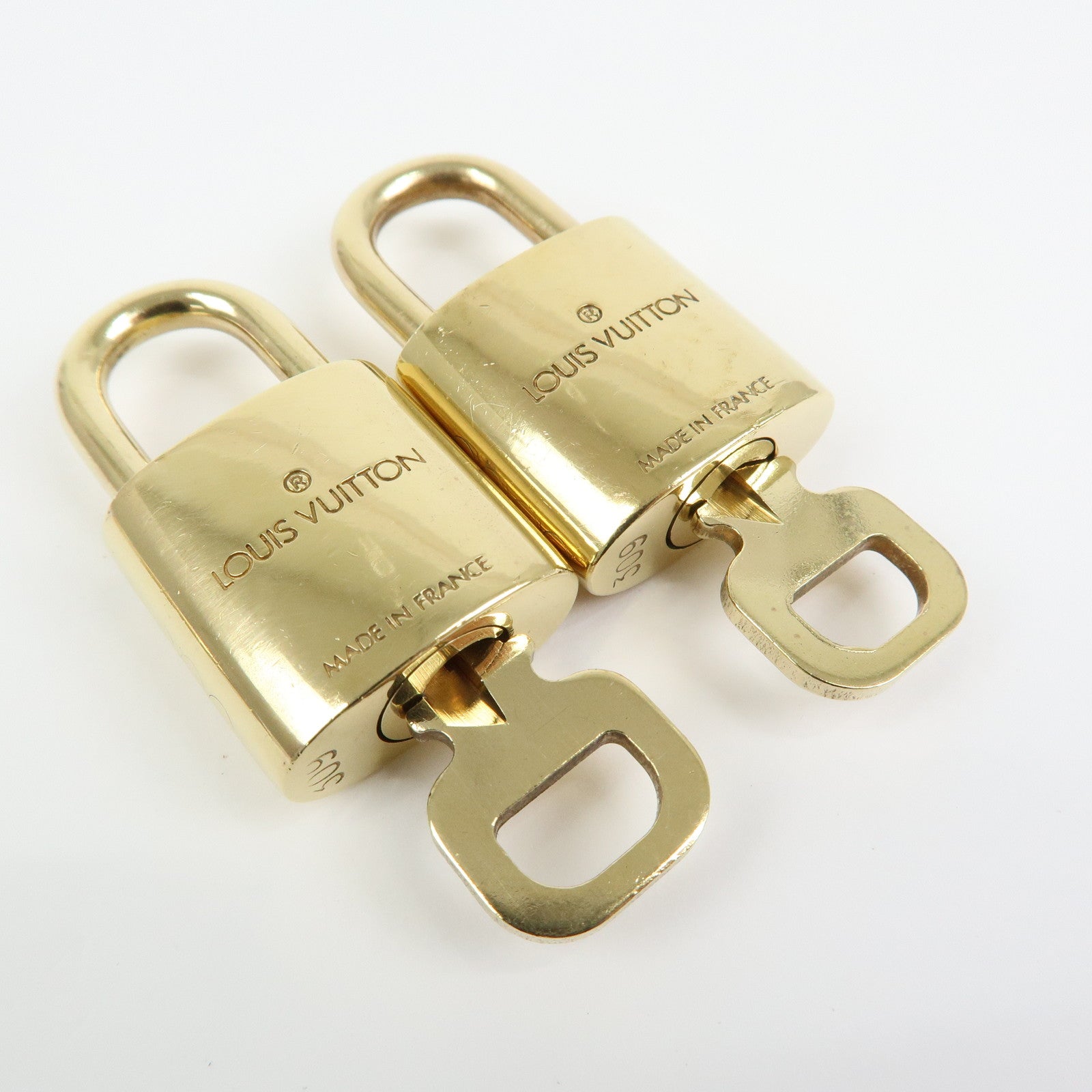 Louis Vuitton Set of 10 Lock & Key Cadena Key Lock Gold