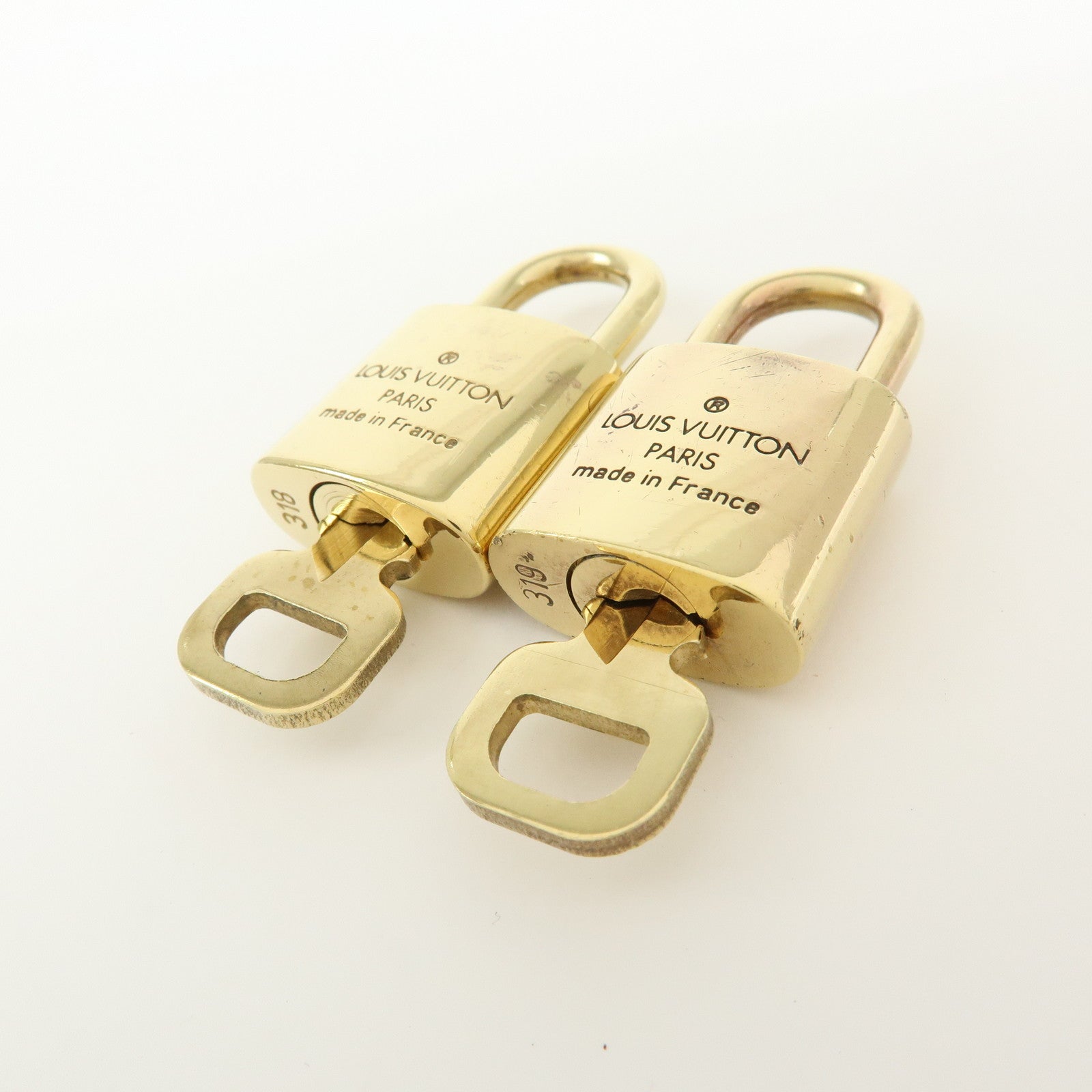 Louis Vuitton Set of 10 Lock & Key Cadena Key Lock Gold
