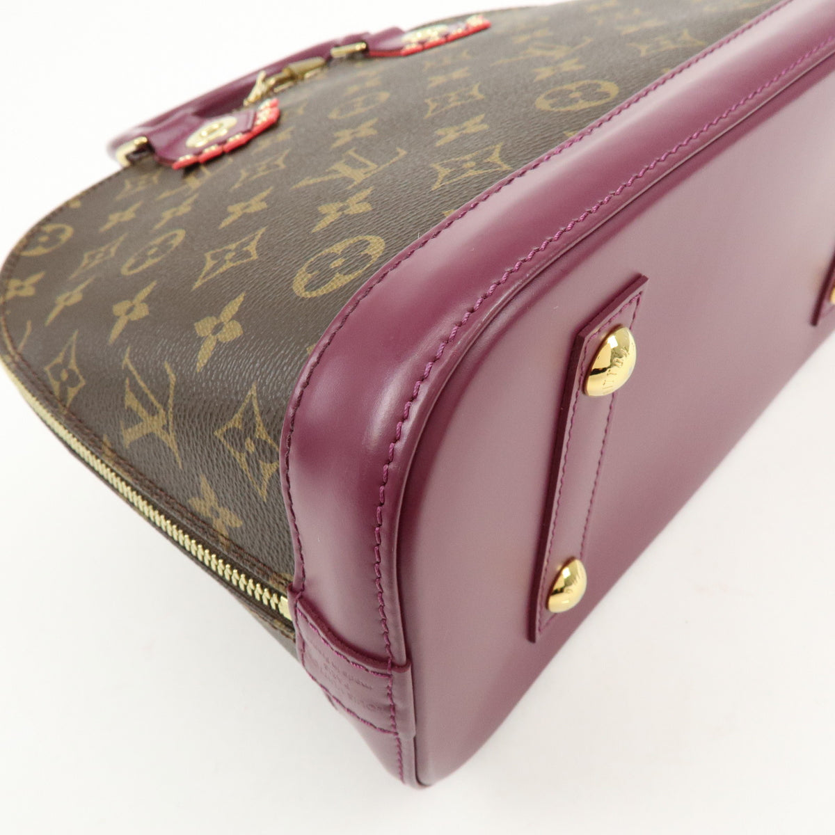 Louis Vuitton Monogram Totem Alma PM Hand Bag Brown Magenta M41662