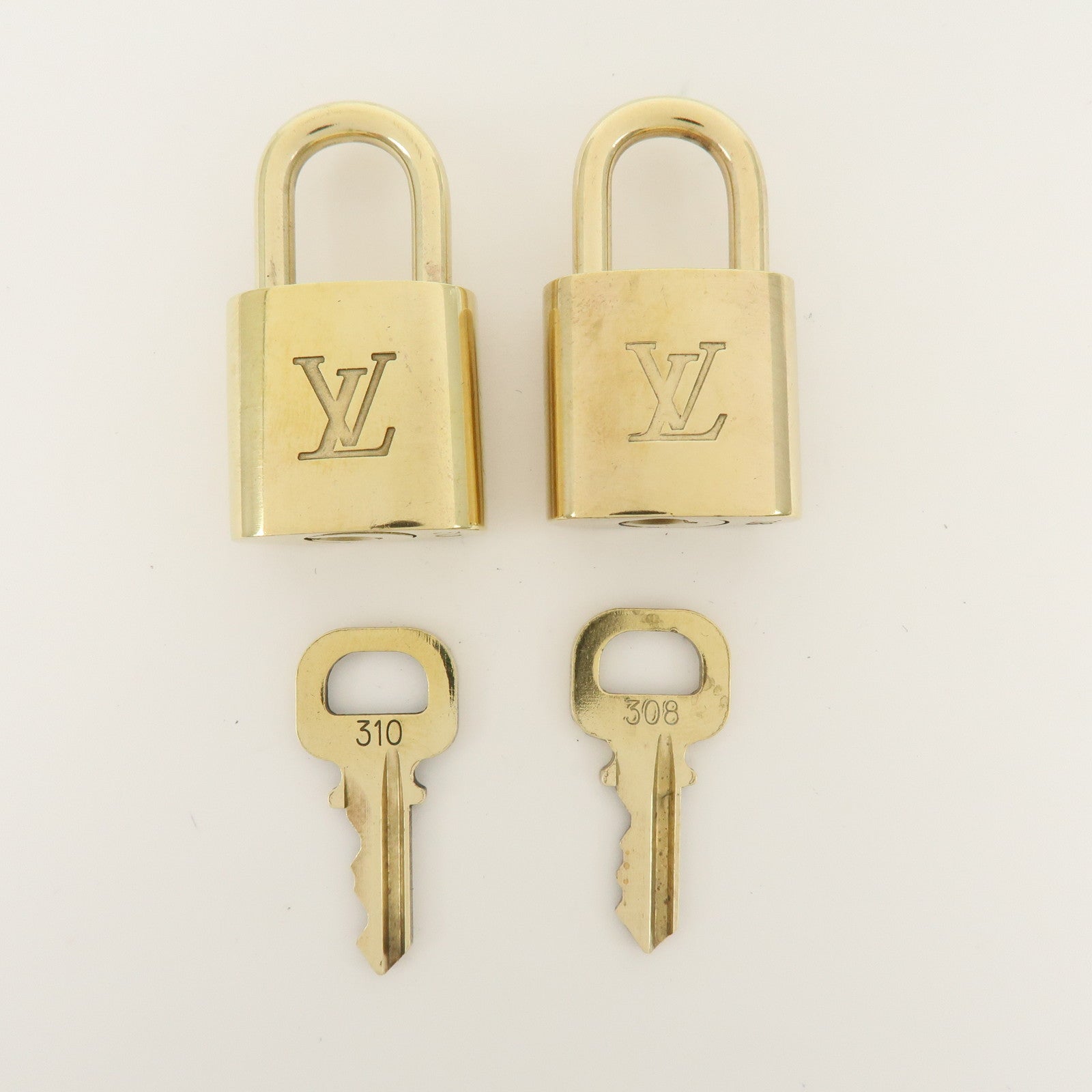 Louis Vuitton Set of 10 Metal Lock & Key Cadena Key Lock Gold