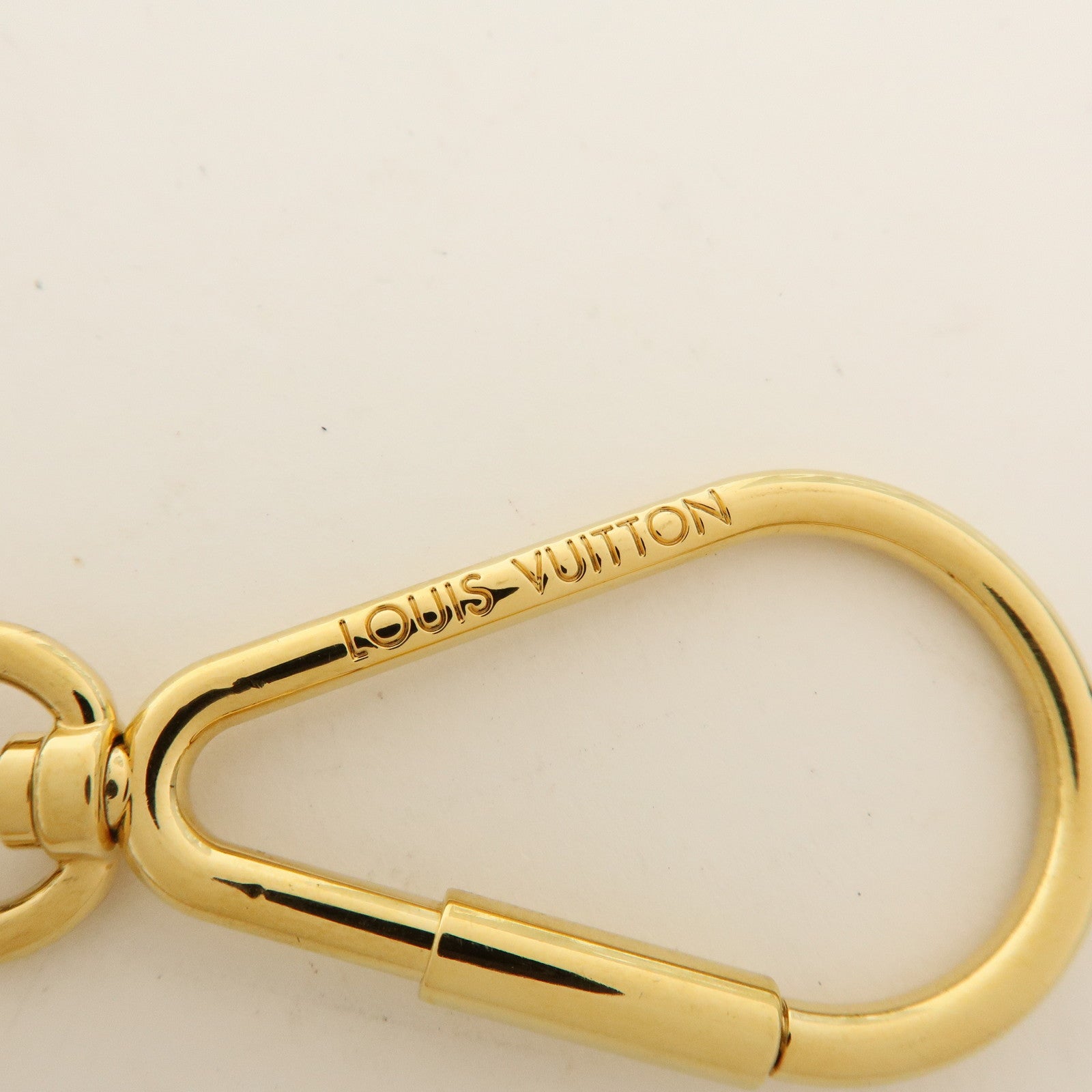 Louis Vuitton Porte Cles Puzzle Bag Charm Dark Brown Gold M65218